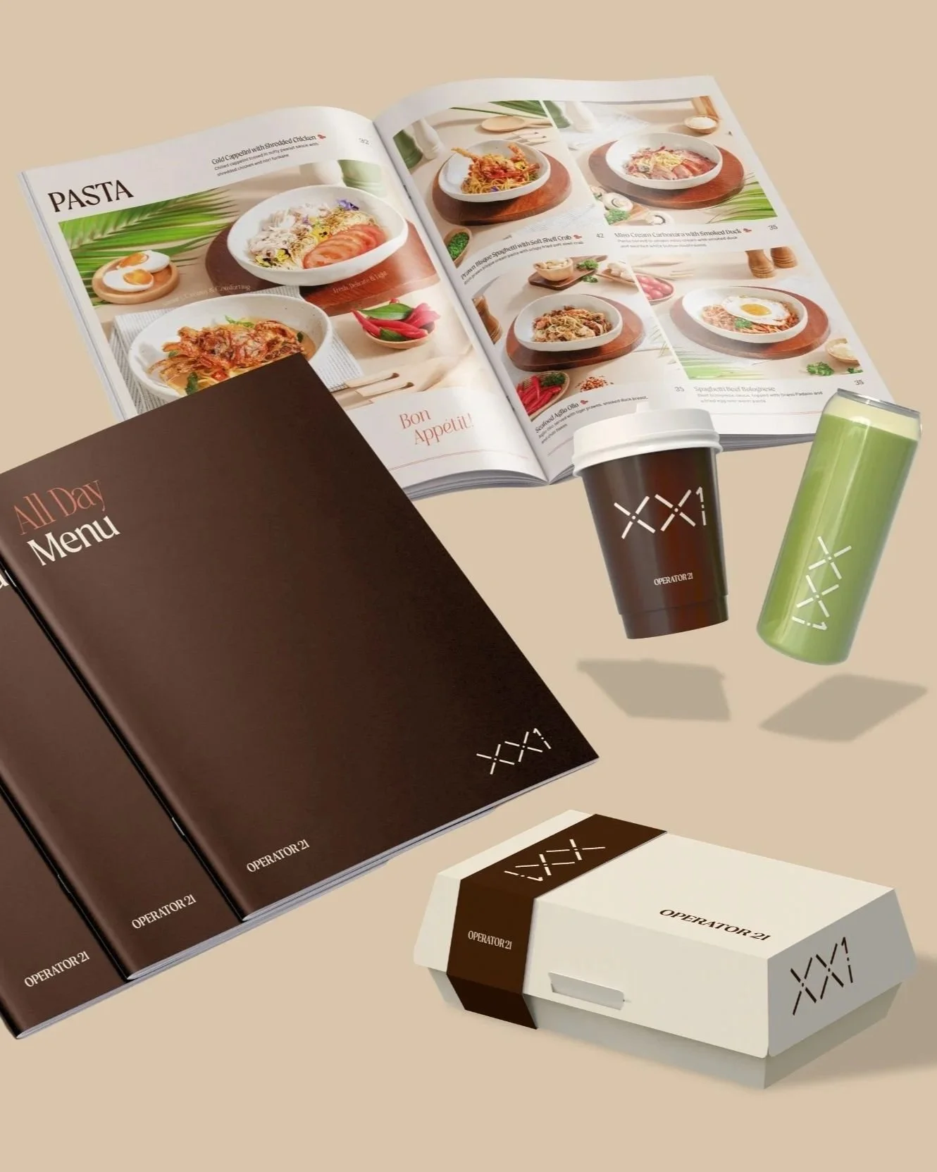 Open menu booklet, coffee cup, green drink, and boxed food on beige background.
