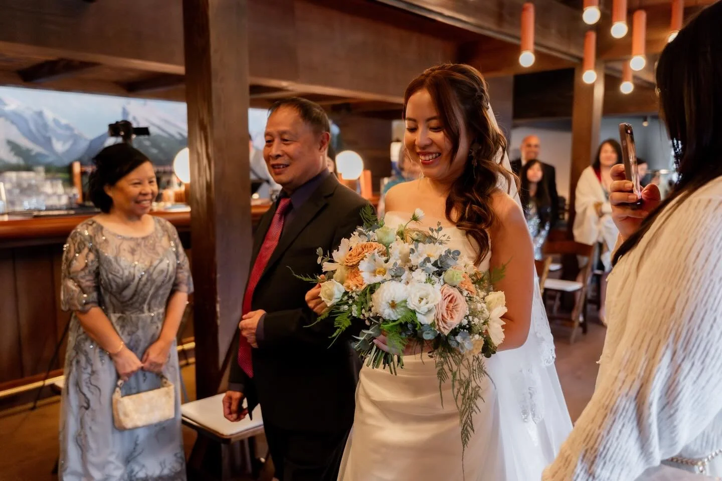 I think I&rsquo;ve done 300+ weddings in my career so far, and I&rsquo;m happy to say that only 2 of them have ever needed to be moved indoors due to weather. Here&rsquo;s a story about one of those times, which happened in August 2025.

My couple fl