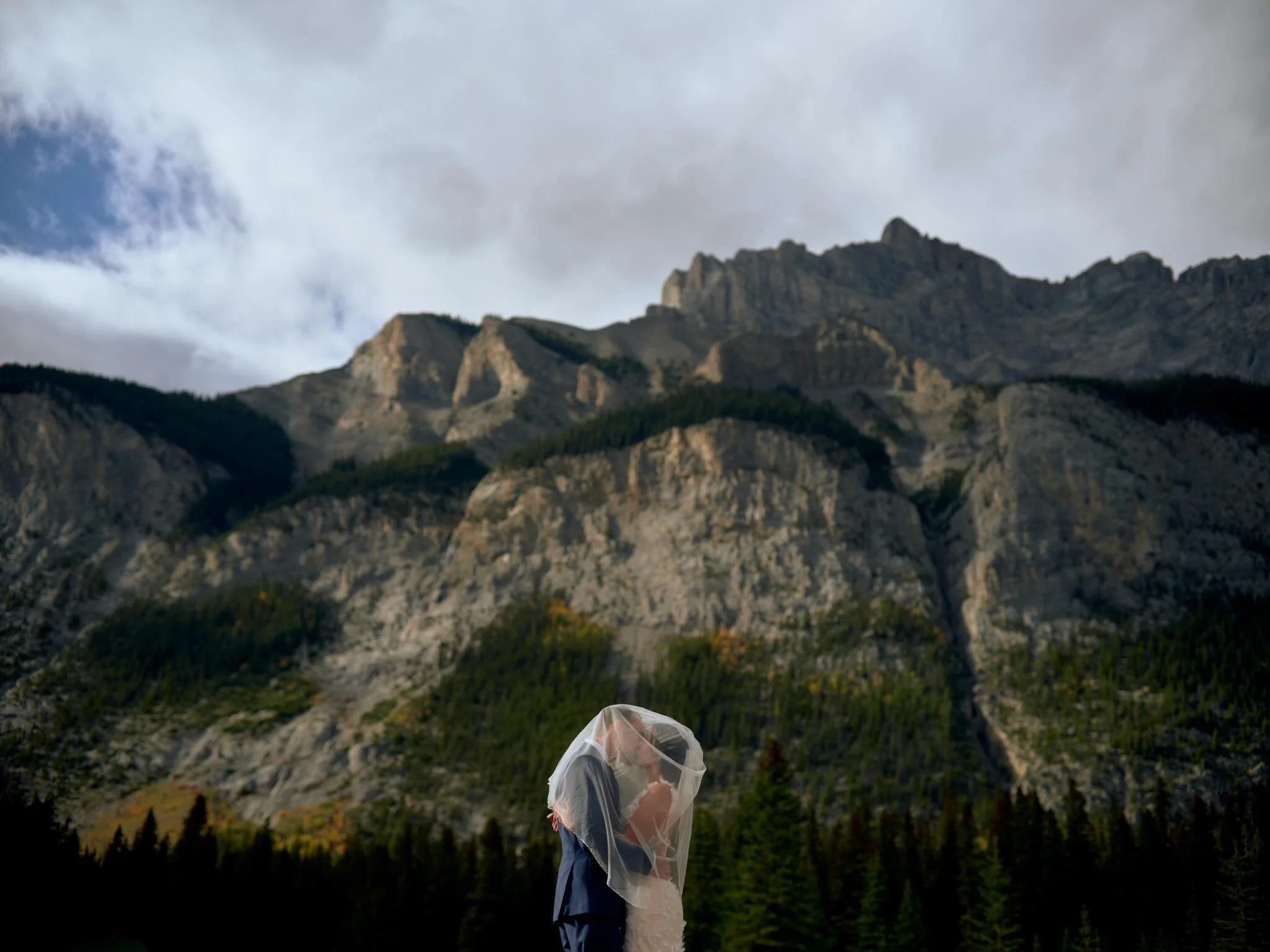 I love this picture. It&rsquo;s symbolic of any wedding day, there may be beautiful views surrounding you, and other stuff like live music, stunning florals, decor, and people cheering you on, but all that matters is what&rsquo;s inside that veil. 

