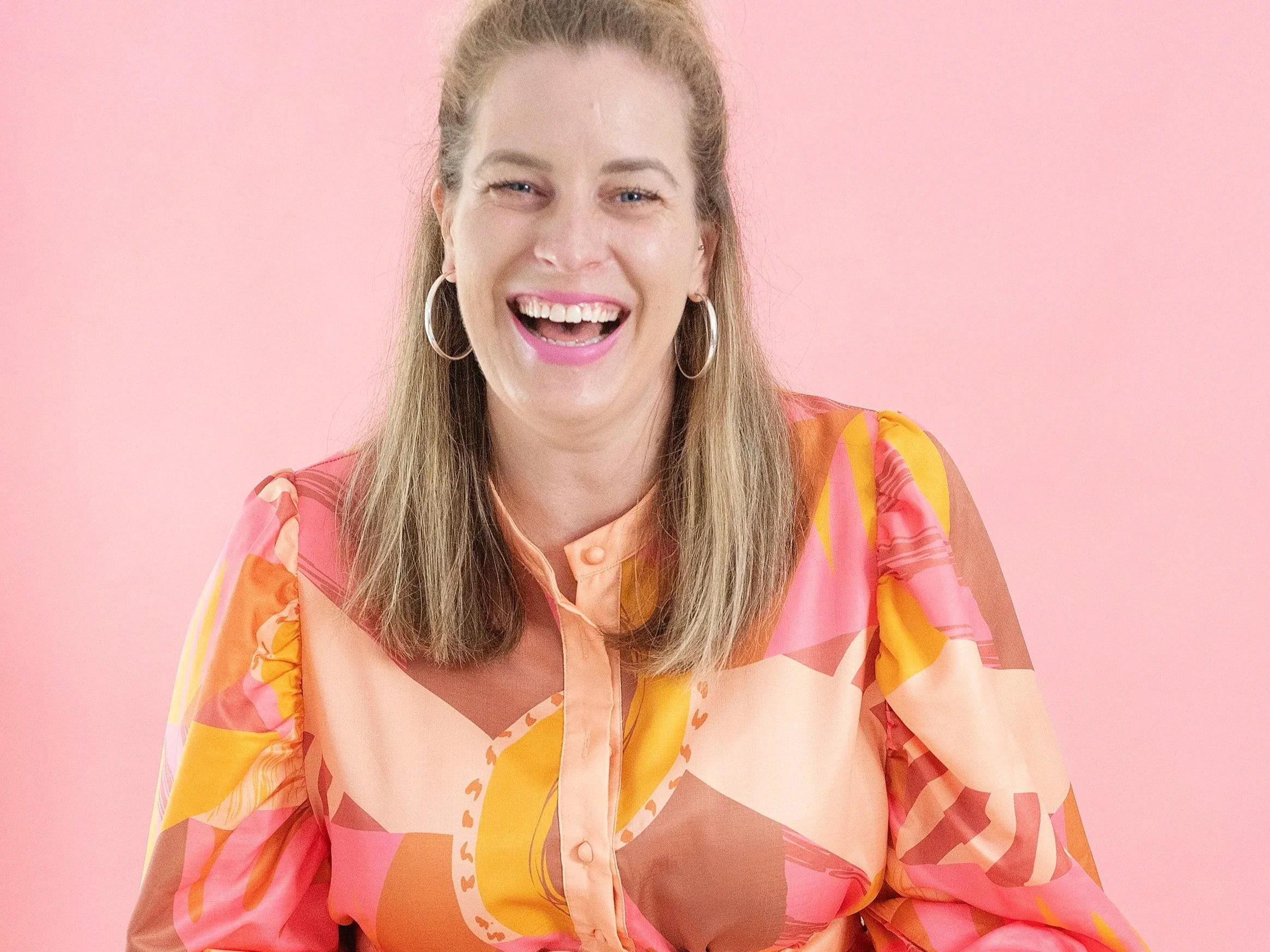 Click the photo of woman smiling to visit the photography page.