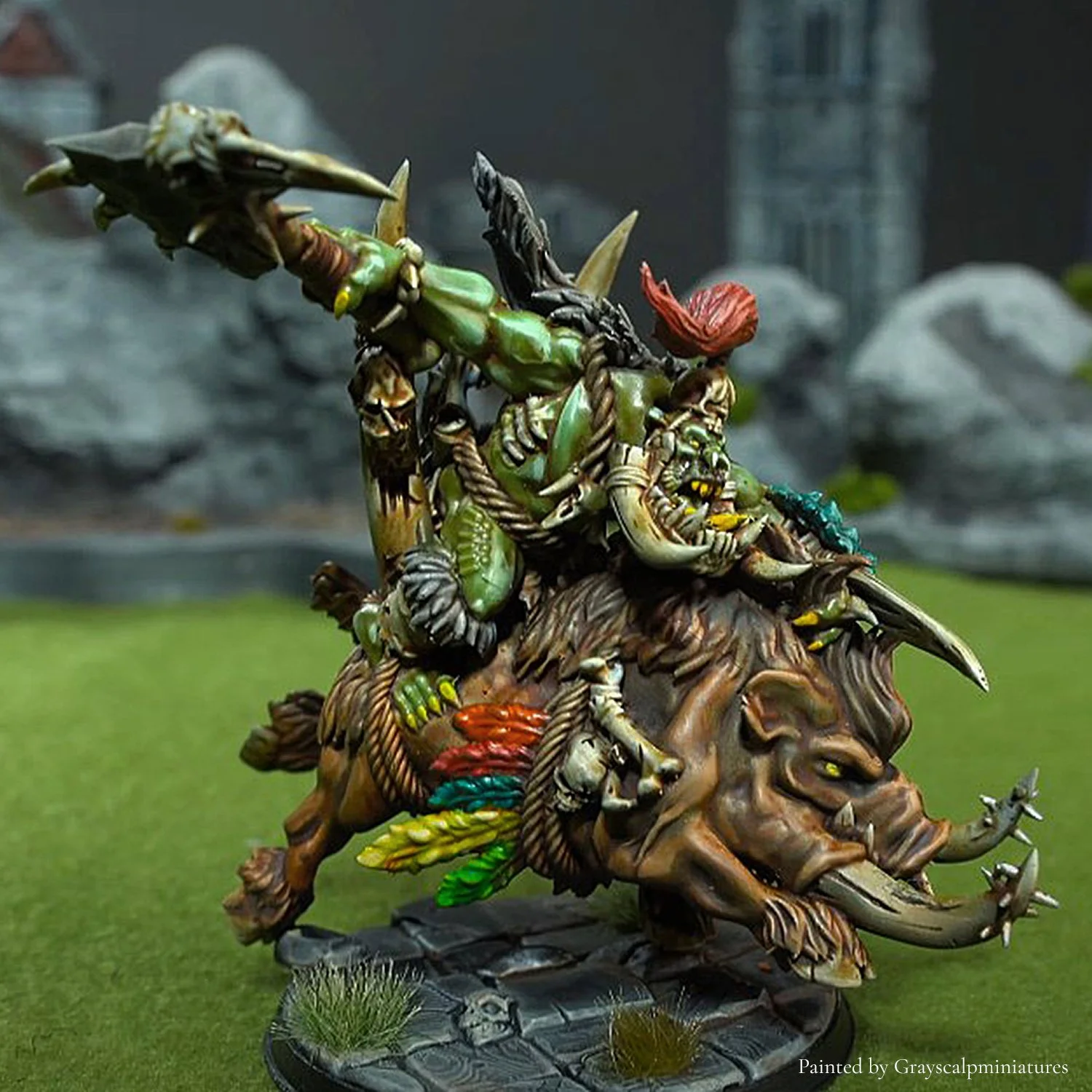 Painted Savage Orc mounted on boar 28mm STL miniature for 3D printing, showcasing tribal armor details, dynamic charging pose and highly detailed beast sculpt. Designed for Old School fantasy wargames and optimized for high-resolution resin printing.