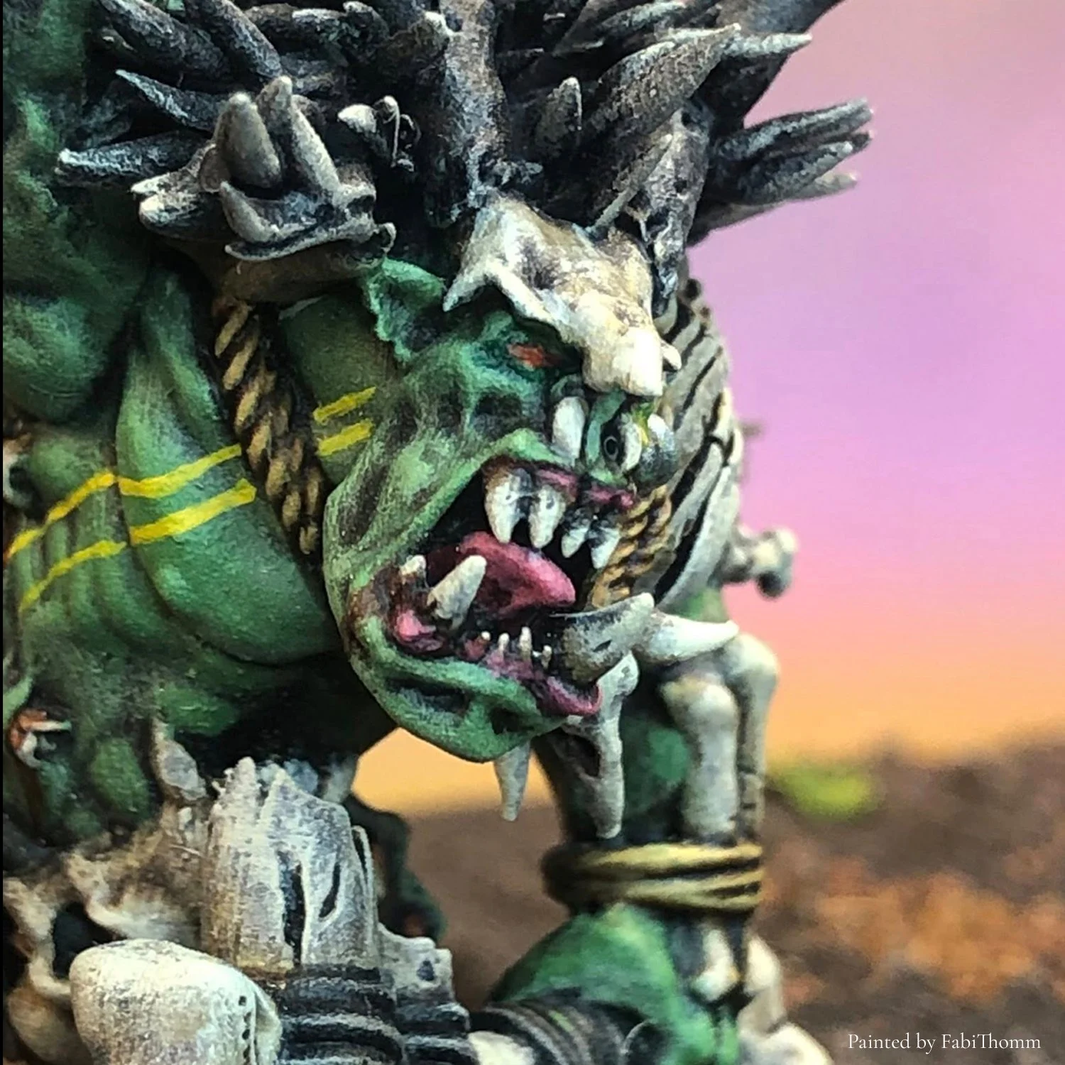Painted Savage Orc 28mm fantasy miniature designed for 3D printing, featuring tribal details, bone ornaments and brutal facial expression. High-detail STL sculpt inspired by classic Old School wargaming armies, fully pre-supported for resin printing.