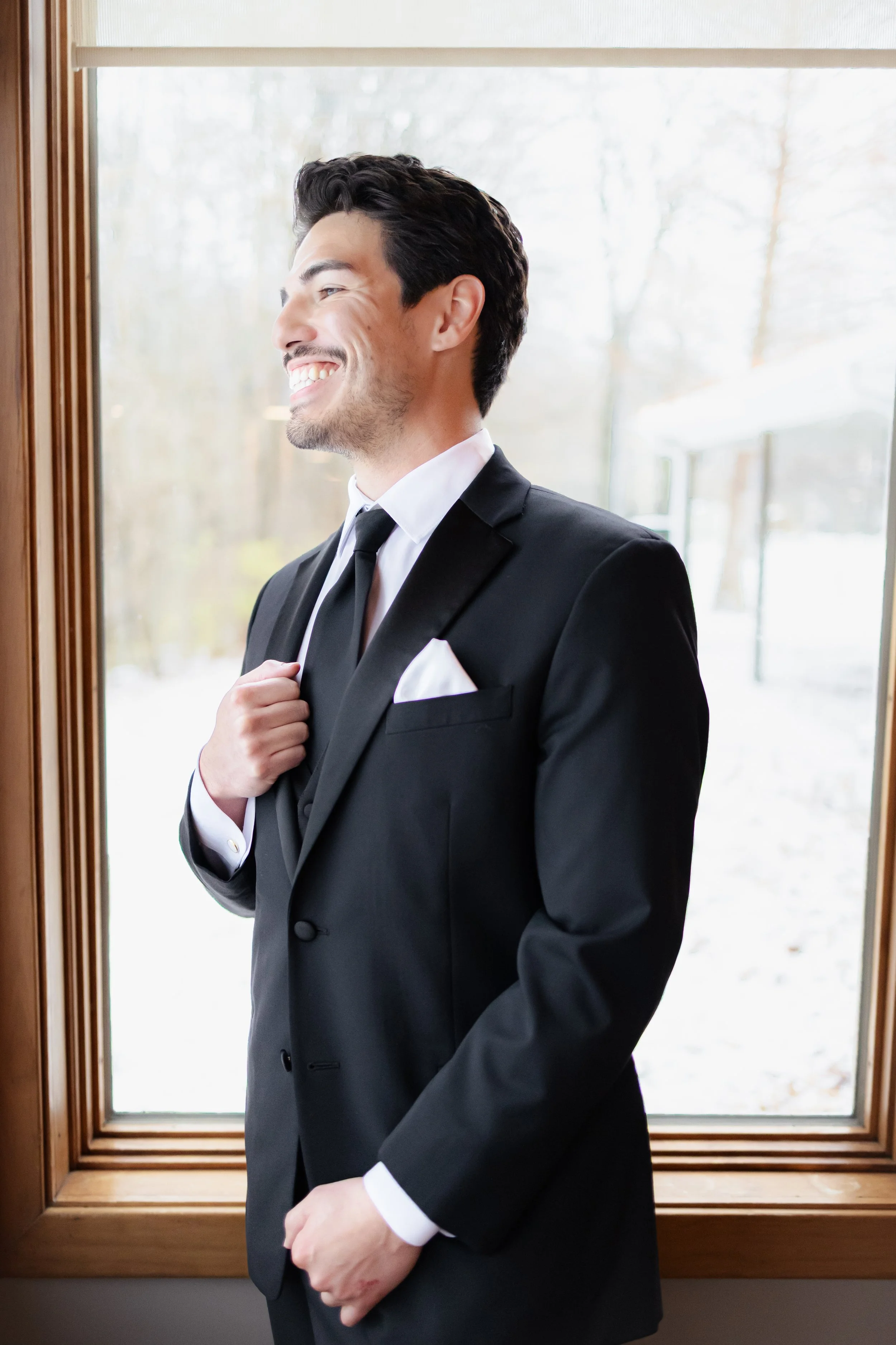Groom at wedding in Indianapolis during wedding photography session