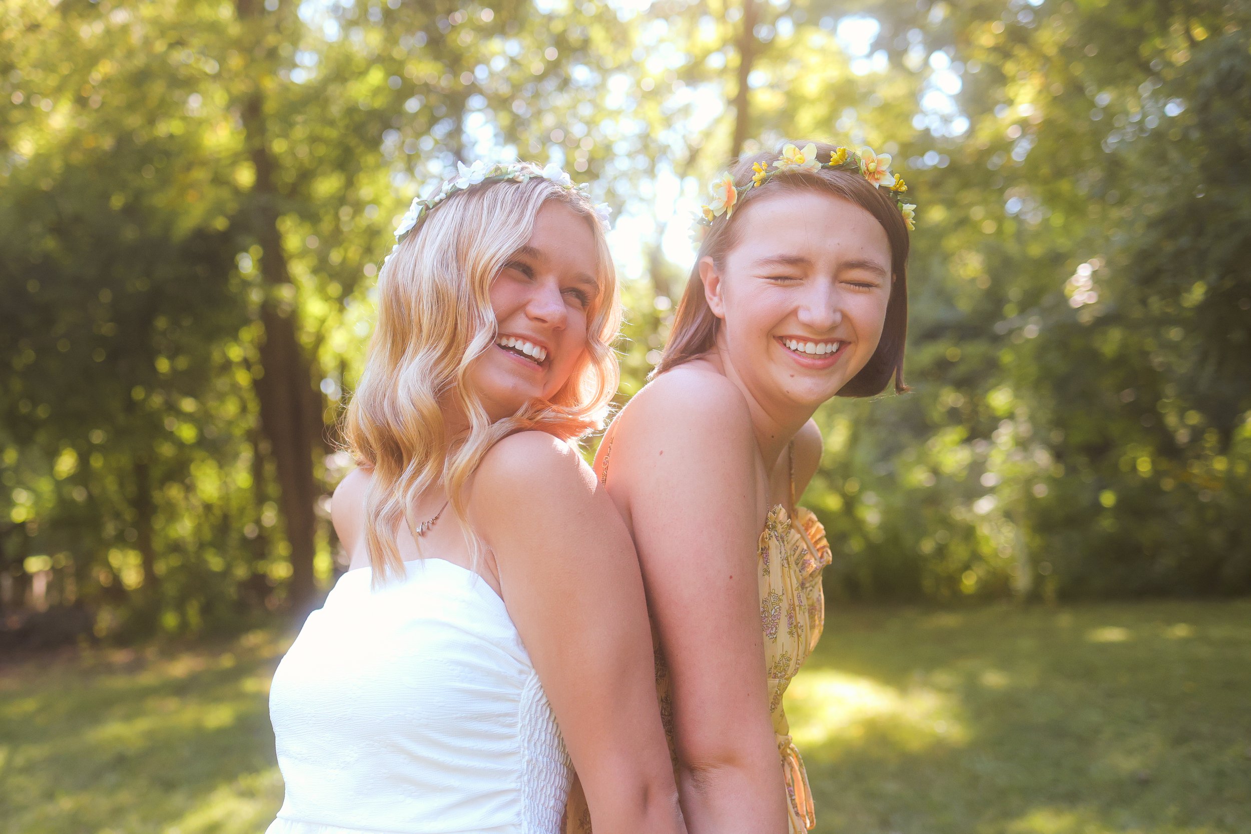 Carmel, IN portrait session of two girls laughing together outdoors in the summer 