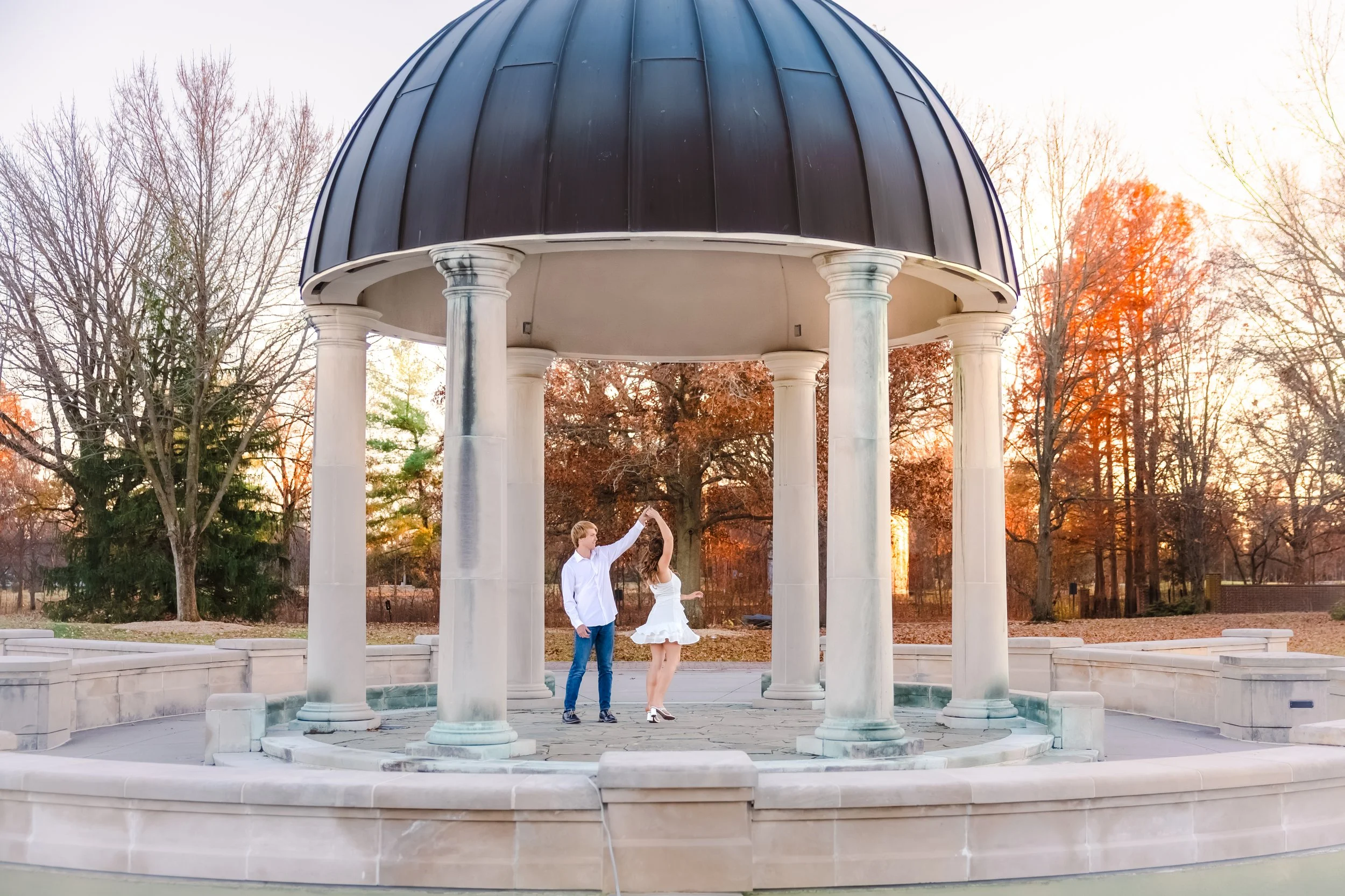 Indianapolis couple engagement photography session outdoors in the fall season with bride and groom.