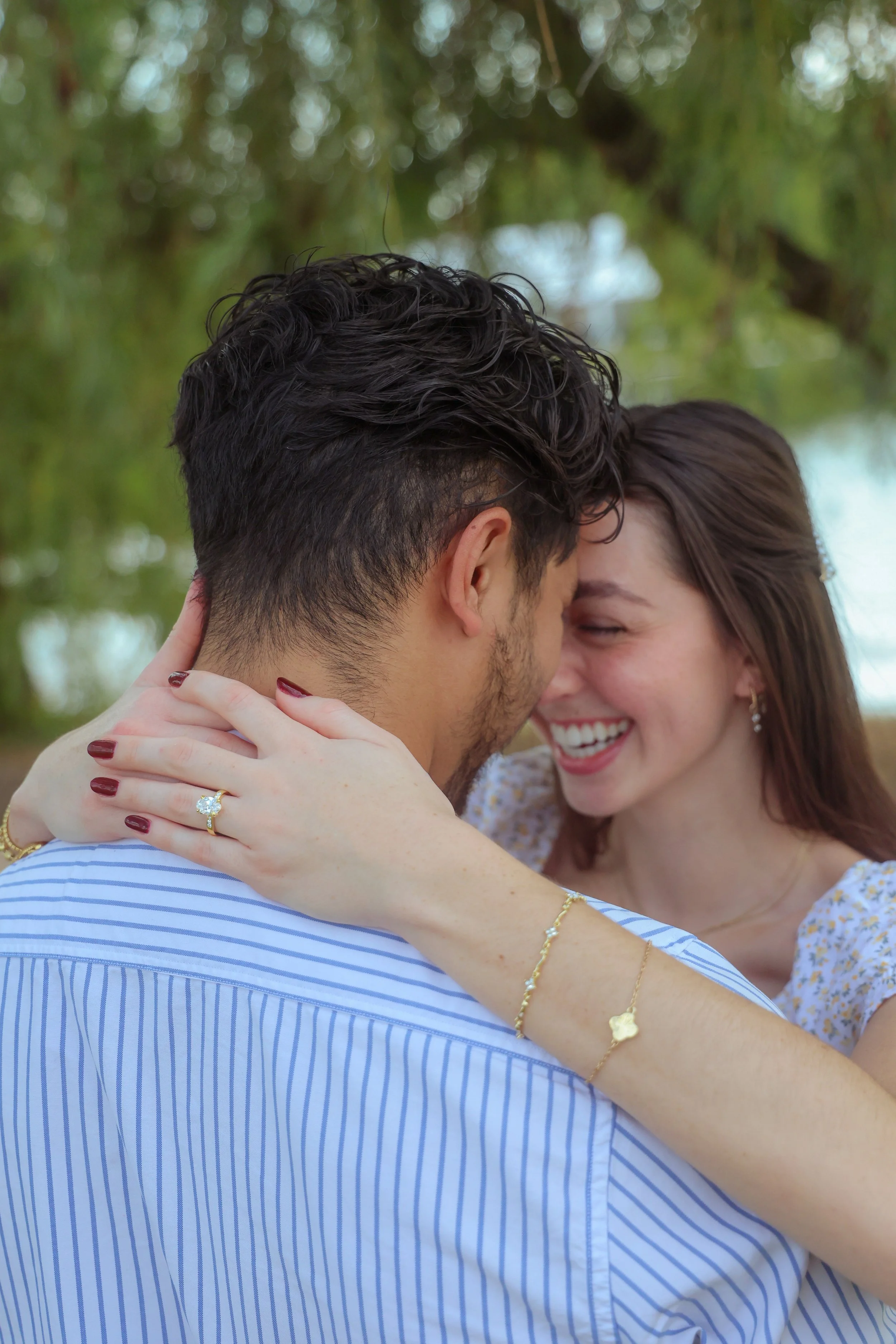 Indianapolos couple posing for proposal engagement photography session where the man proposed and got the moment photographed in Indianapolis, Indiana.