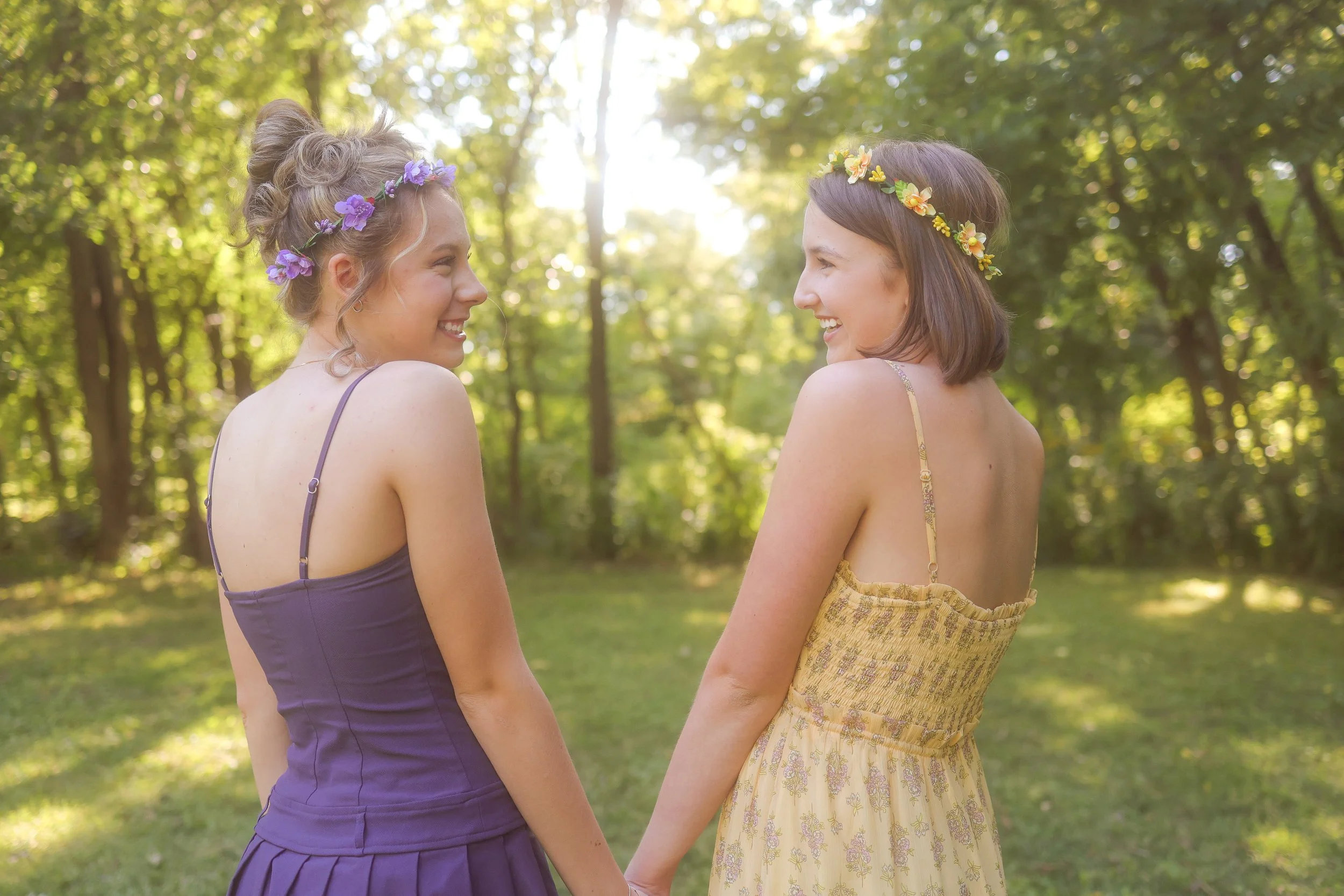 Carmel, IN portrait session of two young girls giggling together outdoors in the summer 