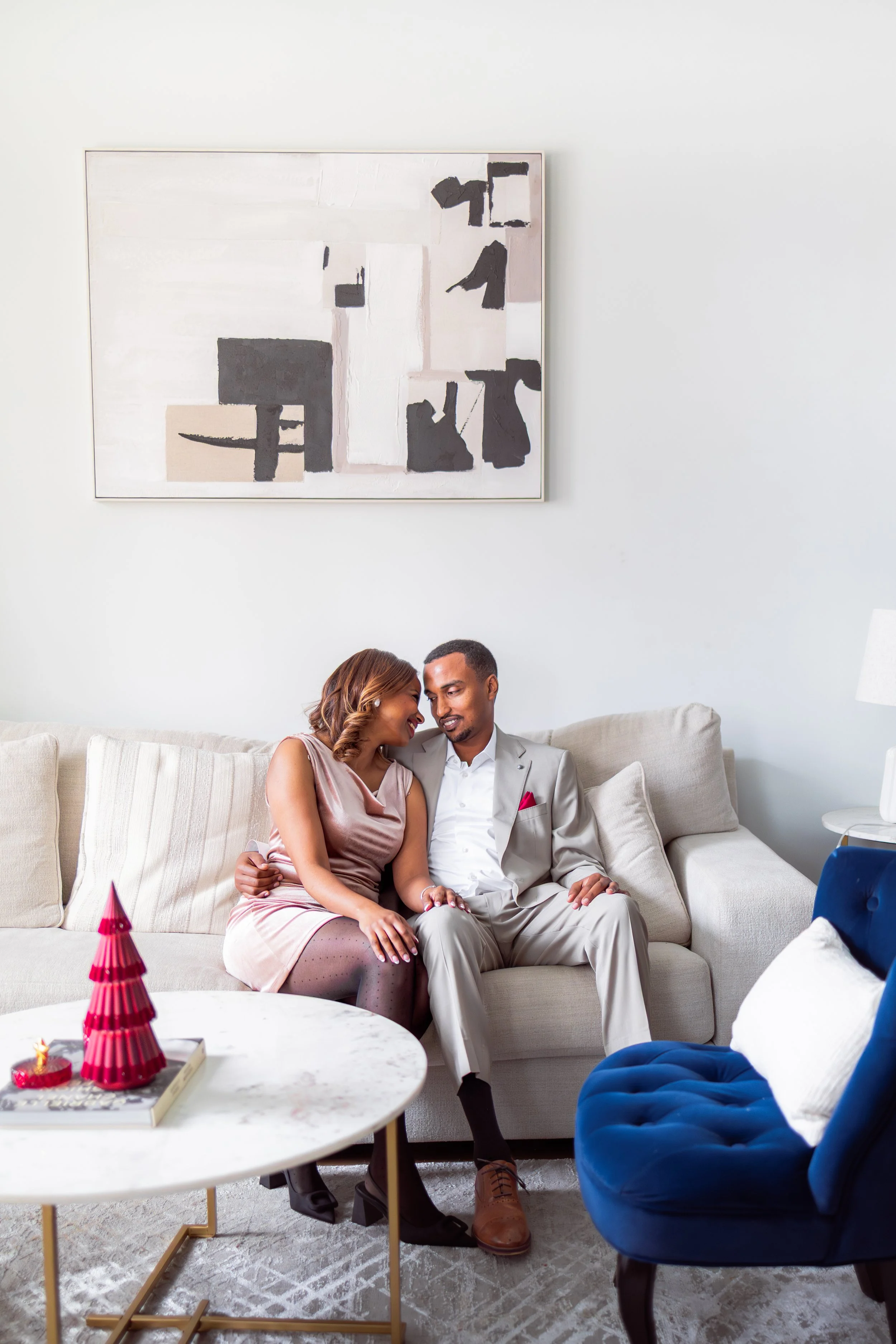 Indianapolis couple getting holiday photos at holiday photoshoot during home session