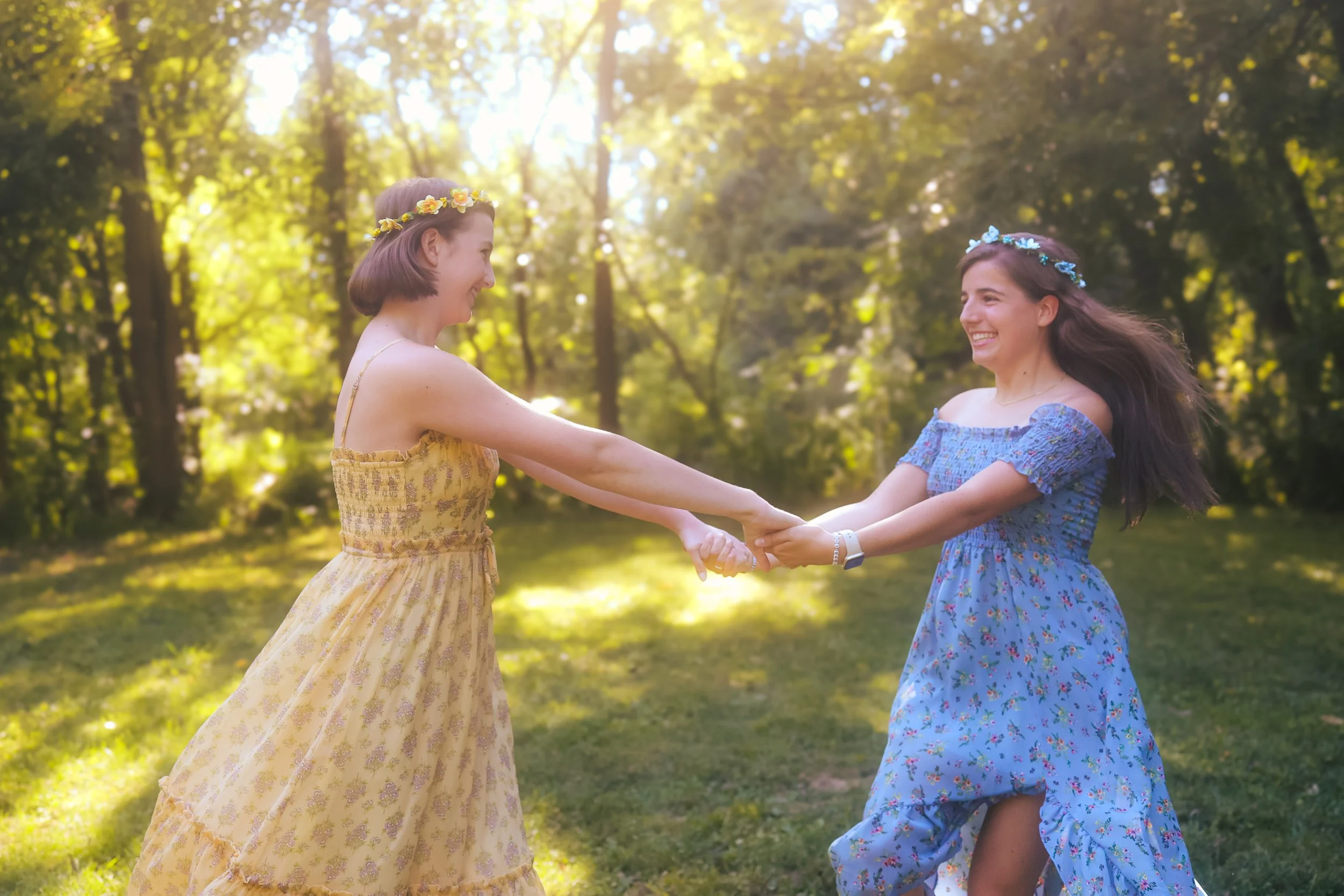 Carmel, IN portrait session of two friends dancing together outdoors in the summer 