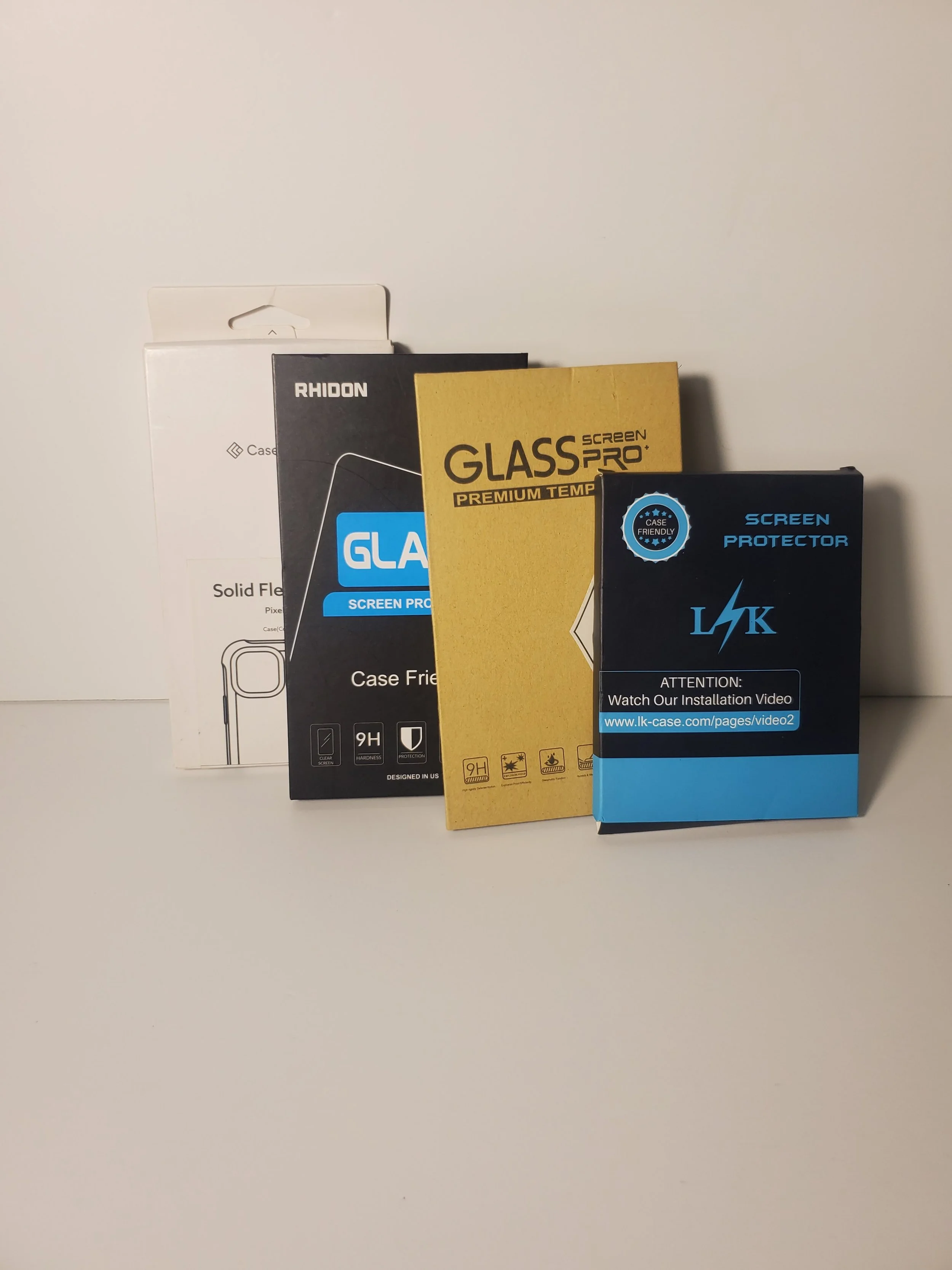 Lot Of 4 New Assorted Phone Screen Protectors & Phone Case
