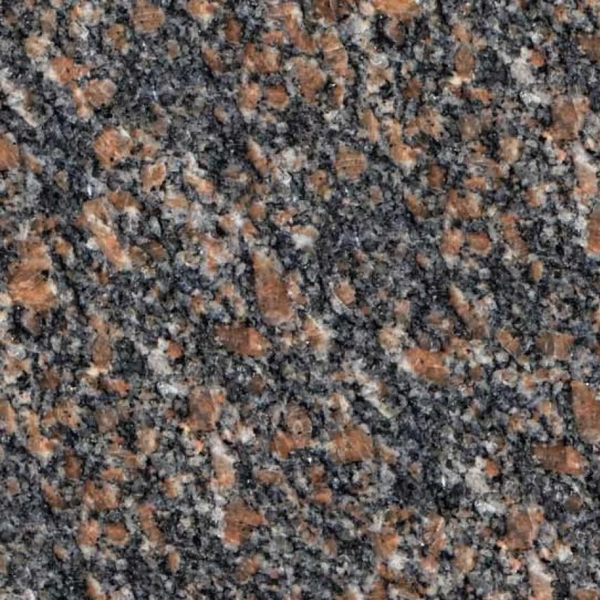 Close-up of speckled granite surface with black, pink, gray, and white crystals.