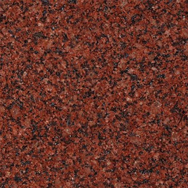 Close-up of a red and black speckled granite surface.