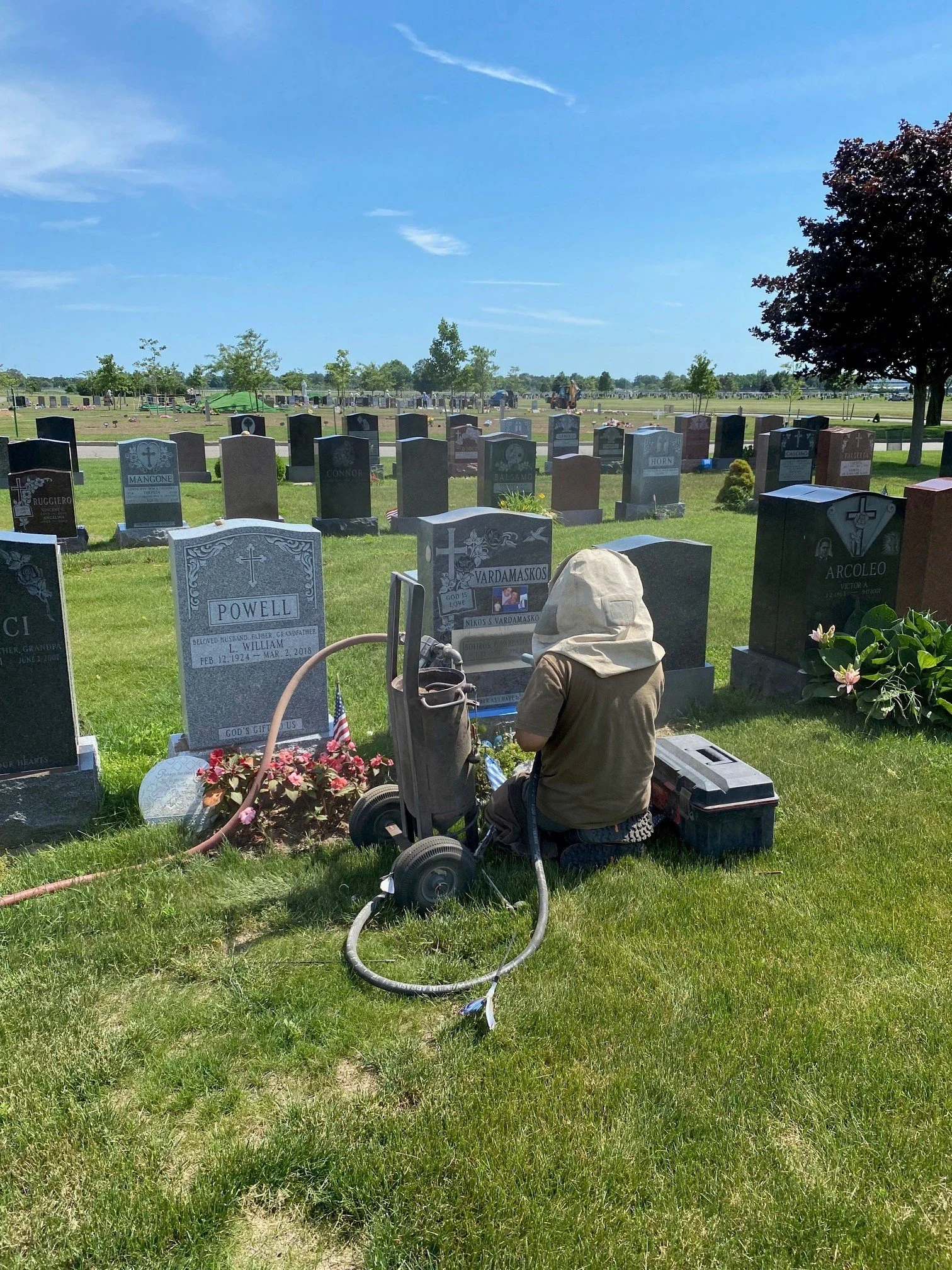 Sandblasting on site in the cemetery