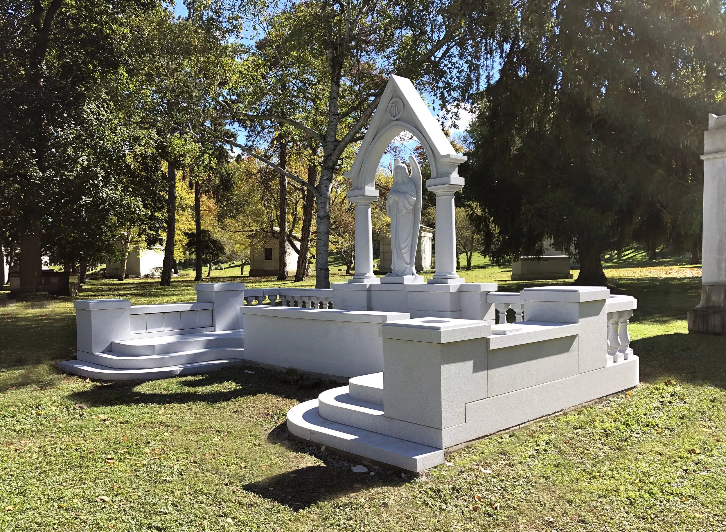 Grey Estate Monument with Hand Carved Religious Figure