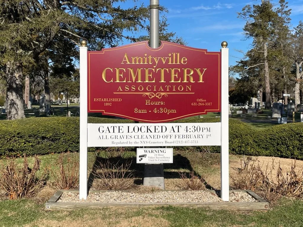 Amityville Cemetery sign