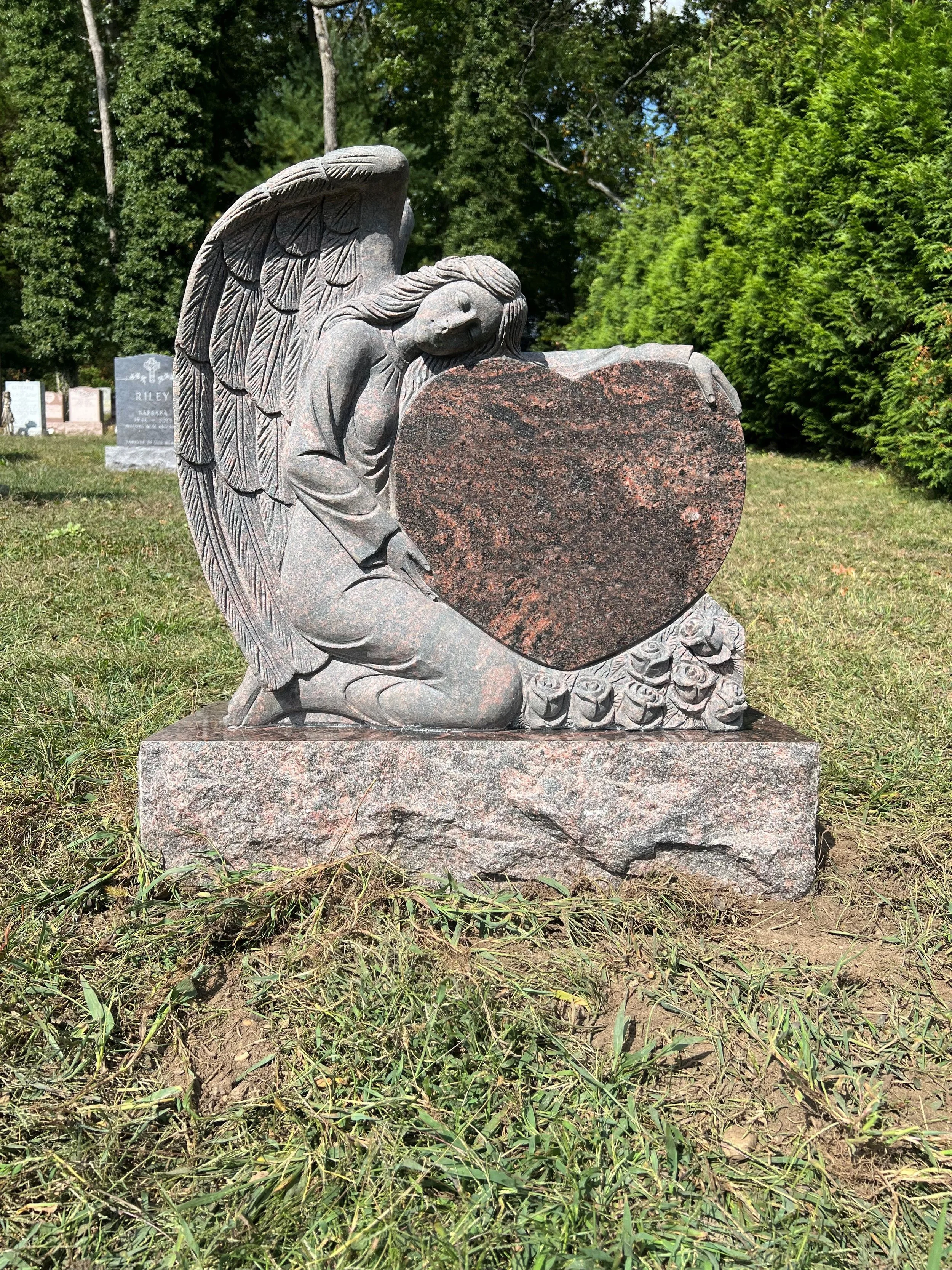 Hand caved angel monument