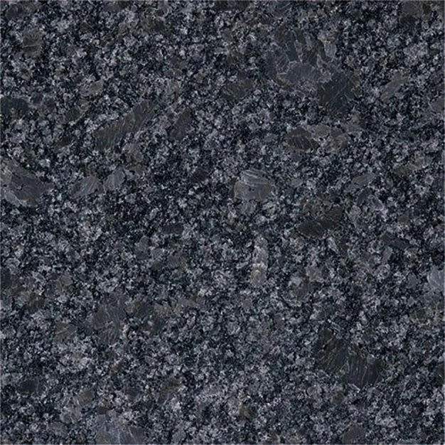 Close-up of a granite countertop with a speckled black, gray, and white pattern.