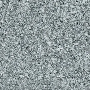 Close-up of a textured, granite surface or pavement