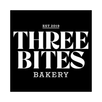 Logo for Three Bites Bakery with black background and white text