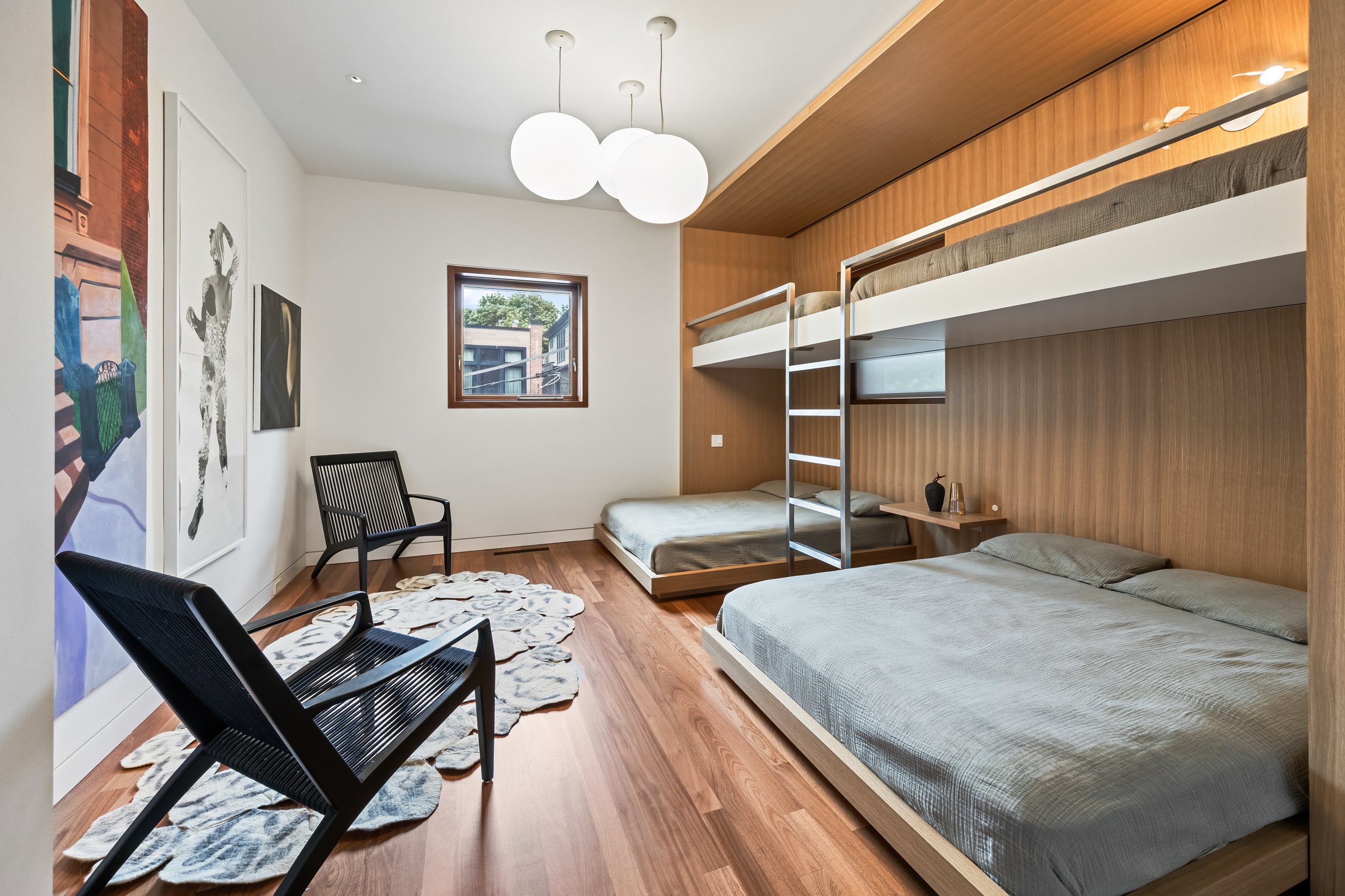 Custom built-in wood bunk bed millwork design and bedroom remodel in Wilmette North Shore home.
