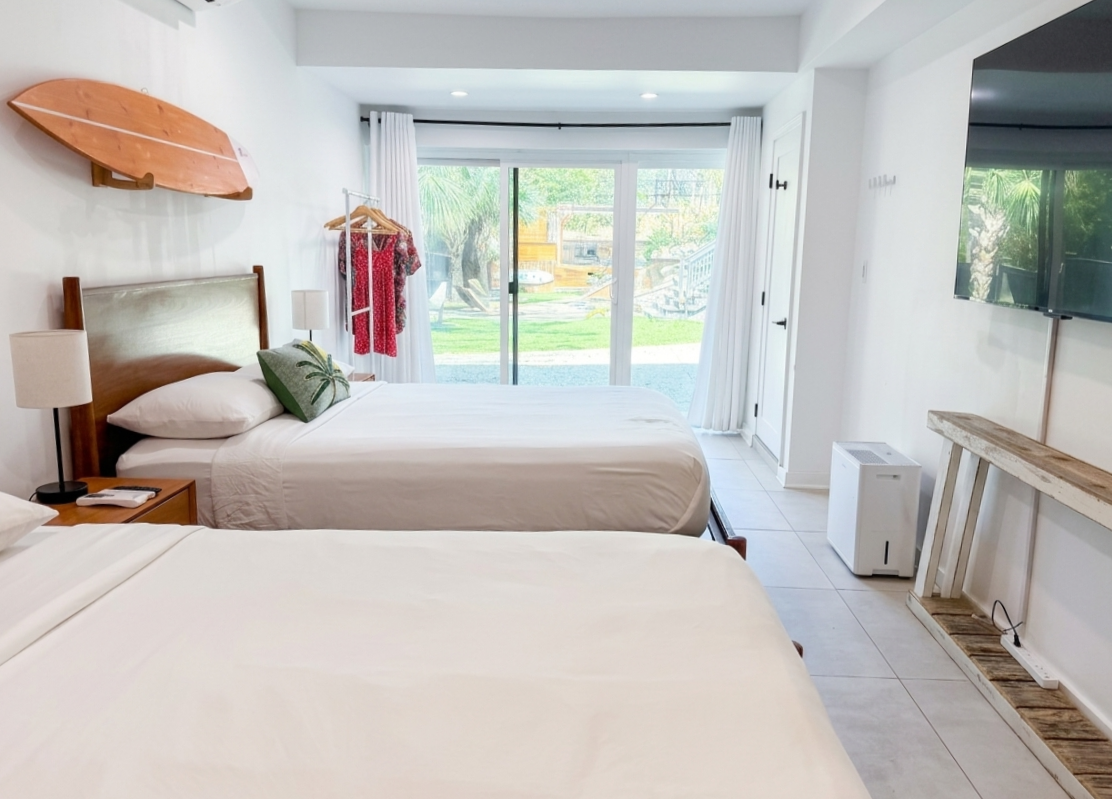 Basement Bedroom with 2 queen beds with private bath, direct access to backyard