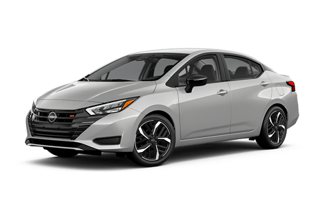 Silver sedan car with black accents and alloy wheels