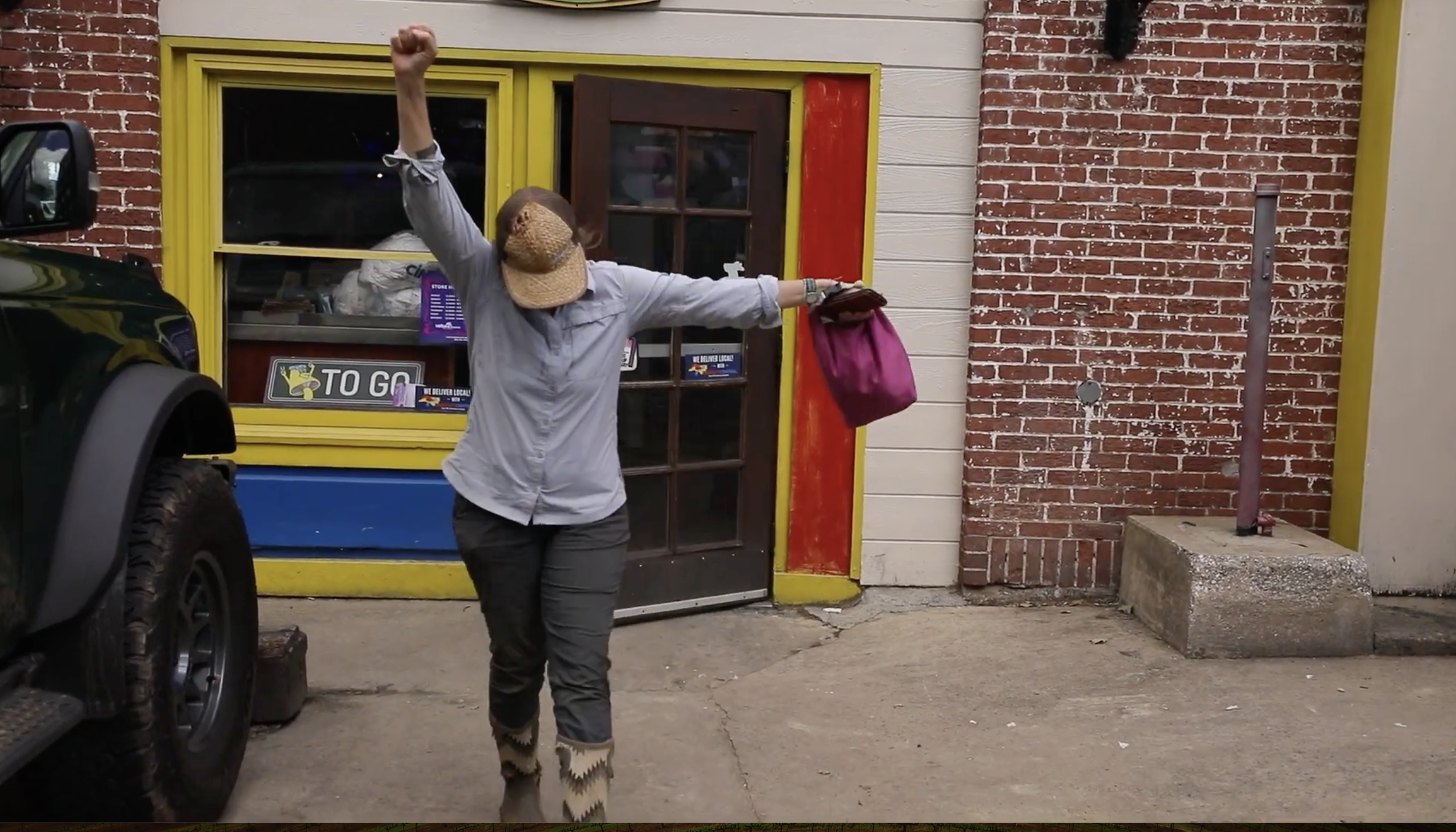 The Motivated Mandy Wallace pumps her fist as she prepares to continue a long day of work.