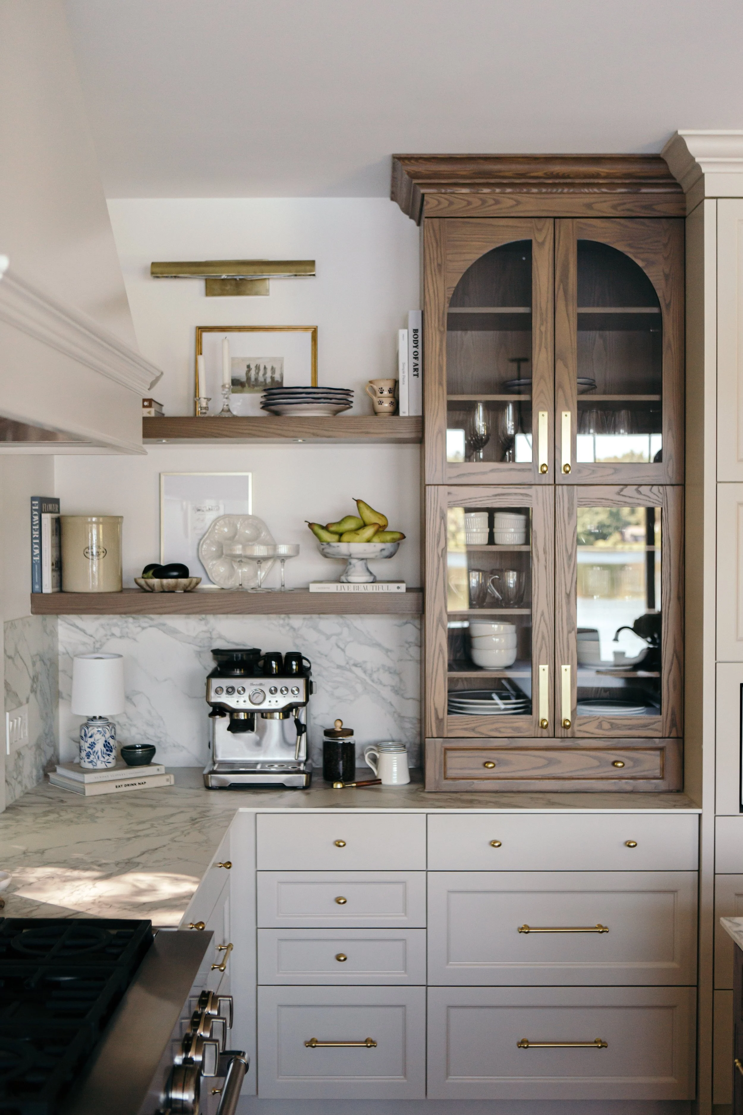 Custom kitchen interior design with wood cabinets and marble countertops— Galla Interiors Ottawa