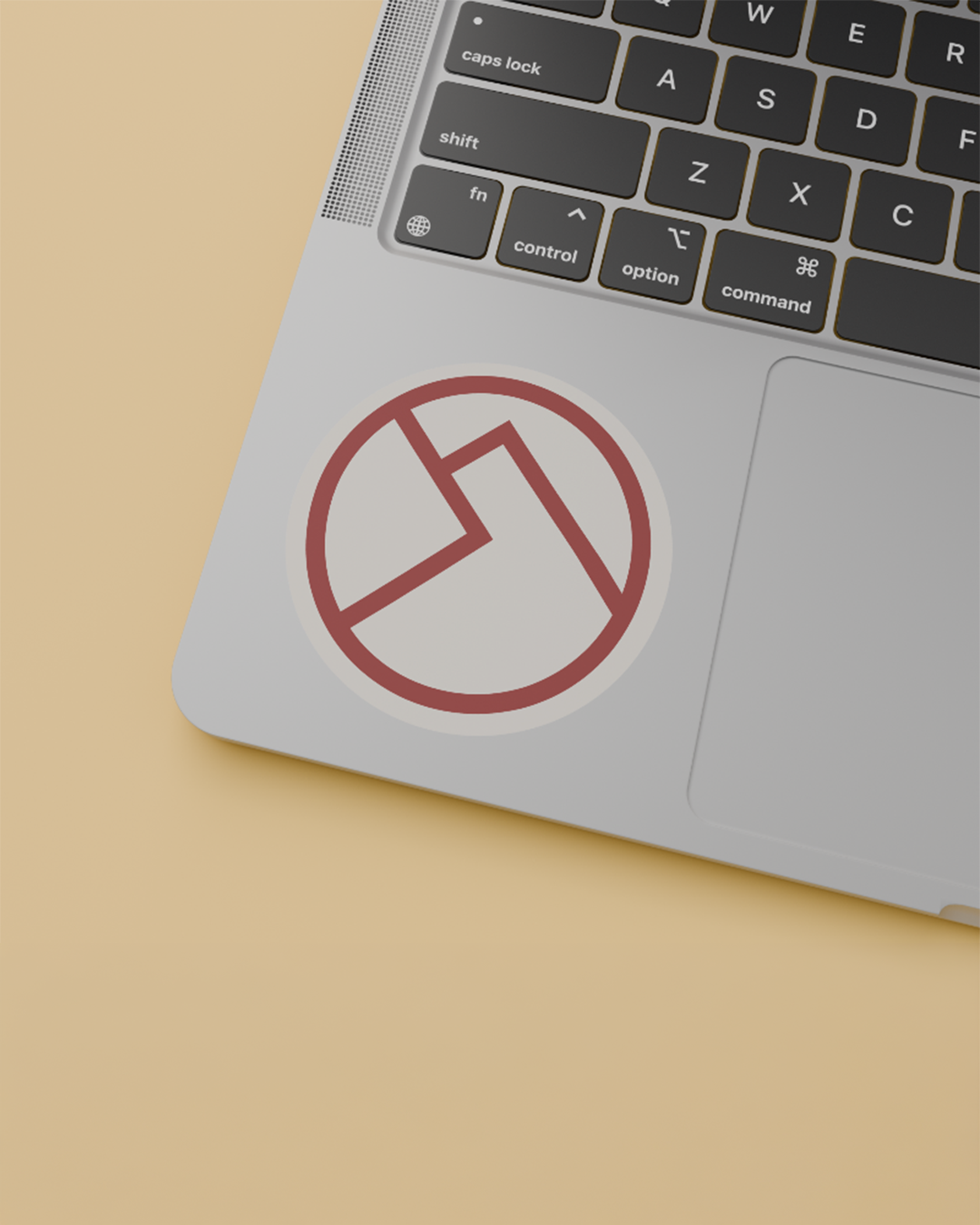 Laptop computer with the Bellavita logo mark sticker near the track pad.