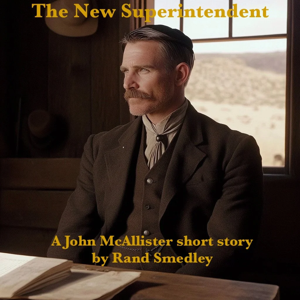 A man dressed in 19th-century Western attire sitting indoors with a window showing a desert landscape behind him. The text on the image reads 'The New Superintendent' at the top and 'A John McAllister short story by Rand Smedley' at the bottom.