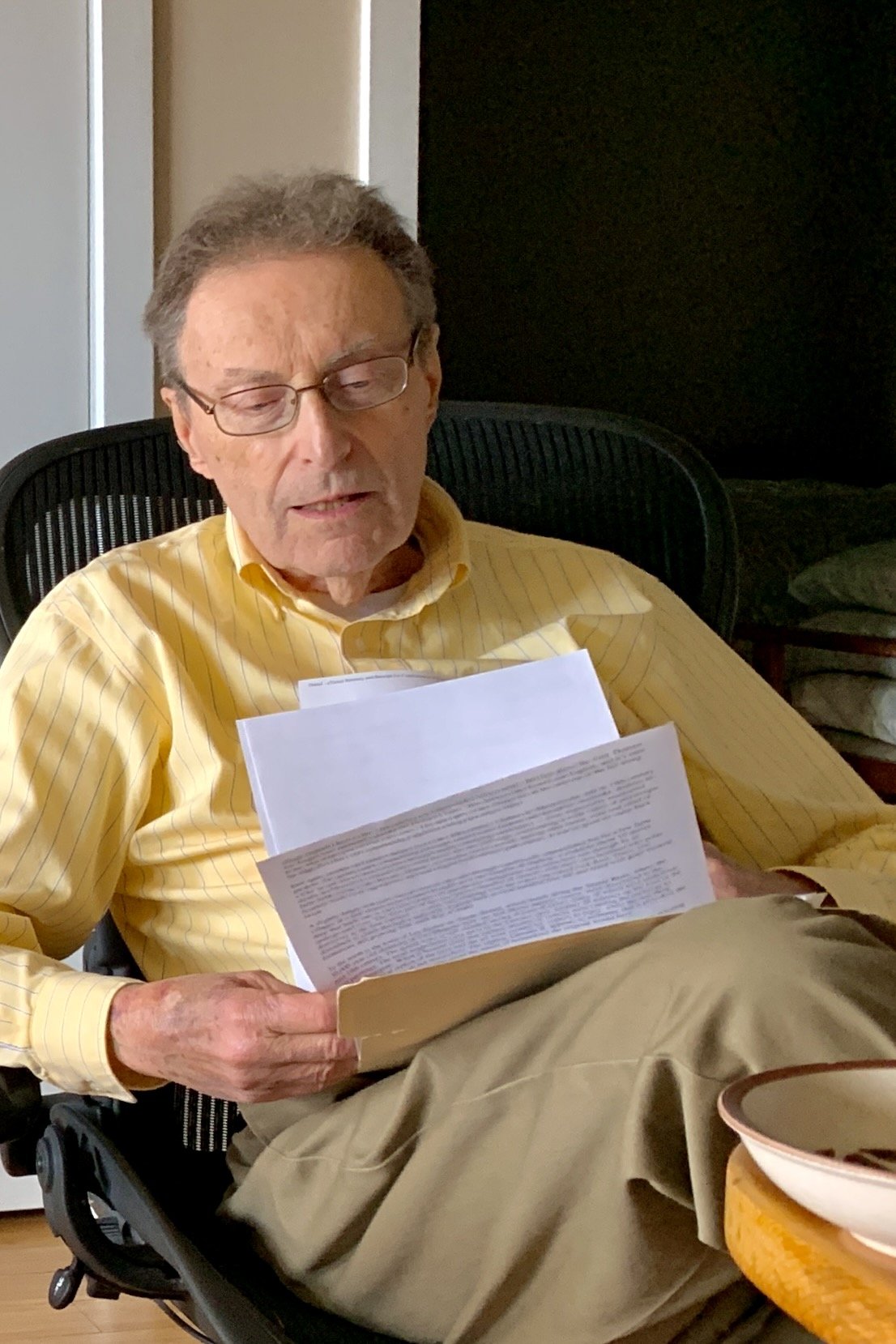 Arnie Langberg reviewing book notes