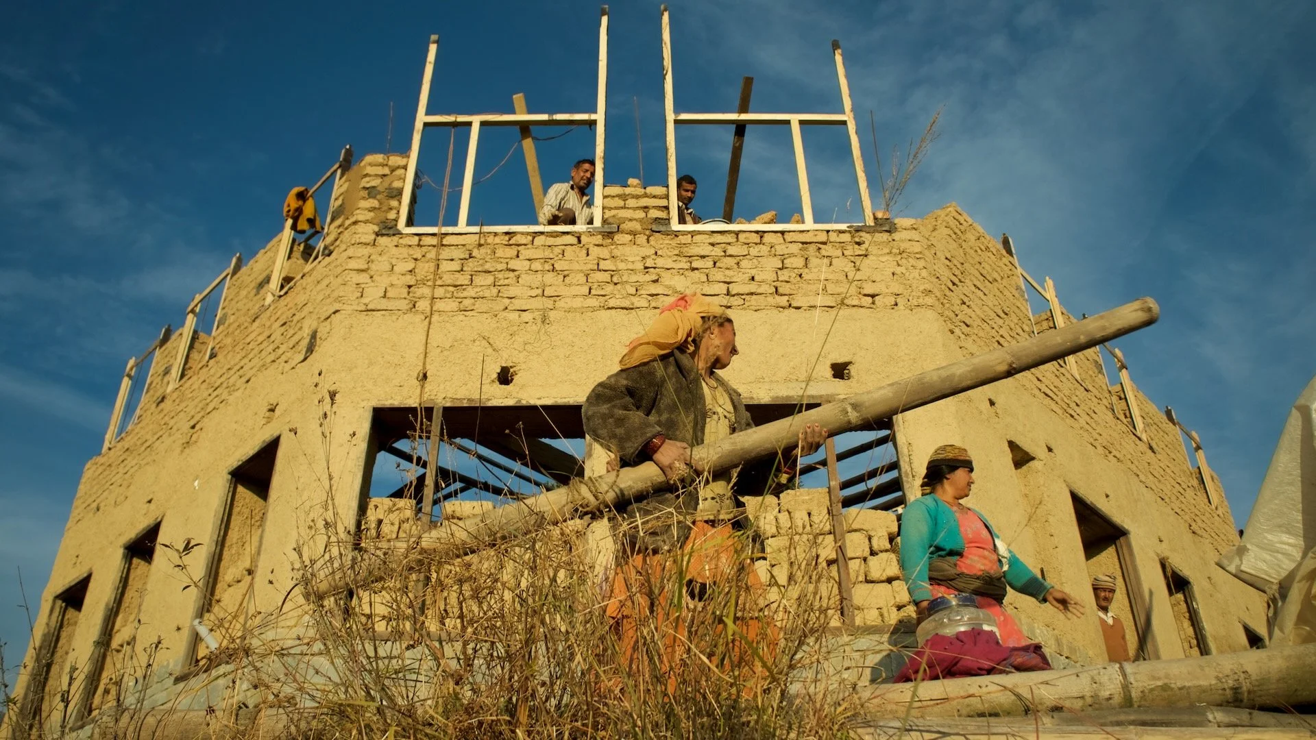 Adobe and bamboo building under construction