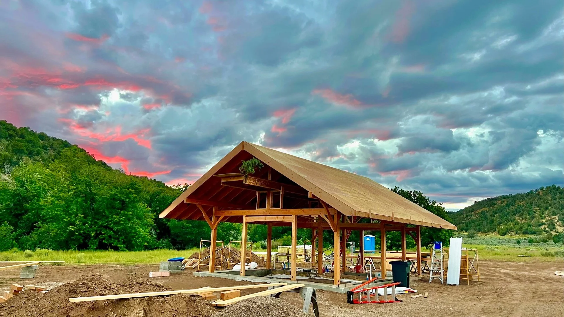 Freshly finished timber frame at sunset