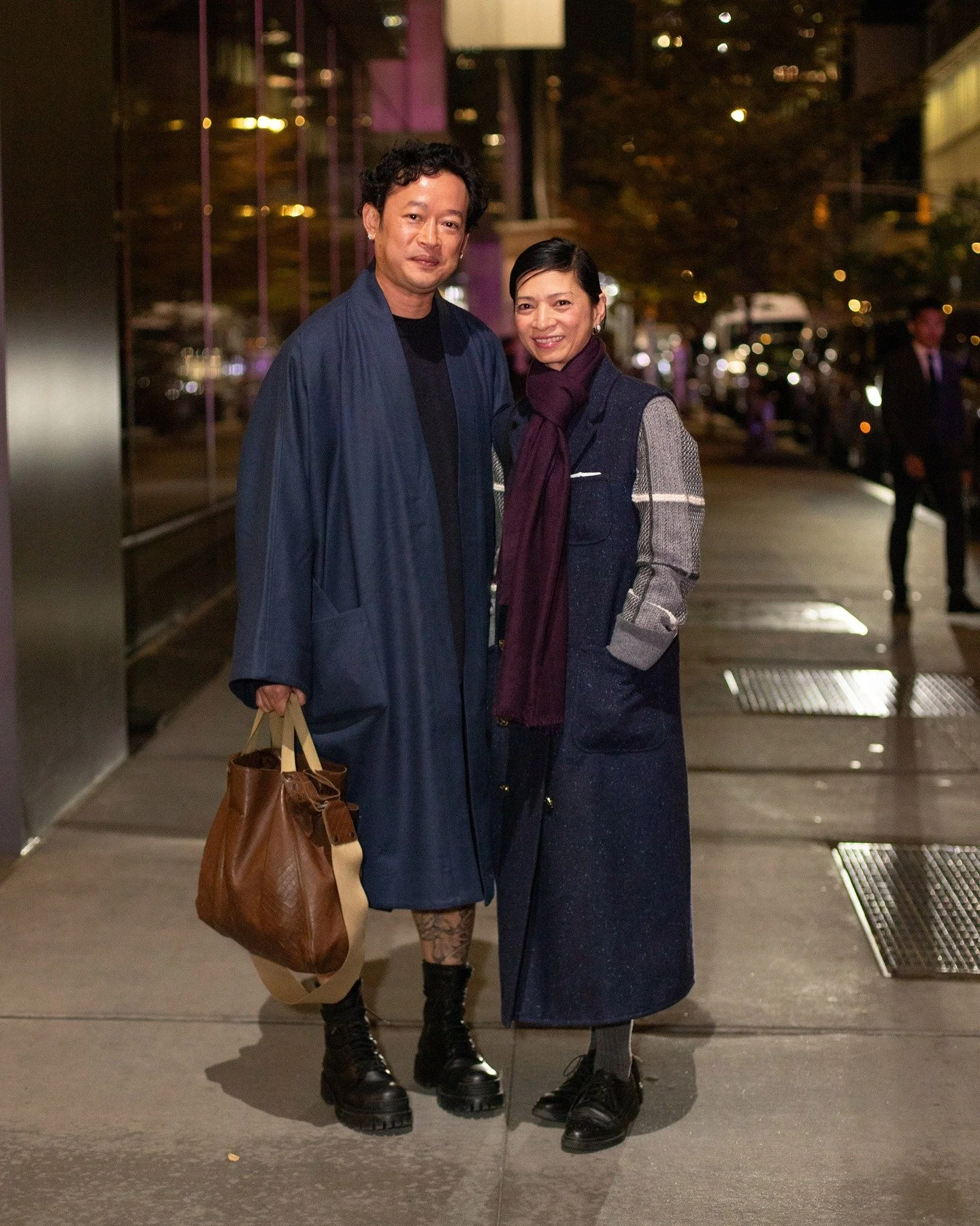 Wednesday late night NYC street style. Why? I dunno. I should probably sleep more. I like the combination of solid colors (blues, brown tones and the purple scarf) with the gray patterns. I think that's @thombrowne. Someone please tell me if it is or