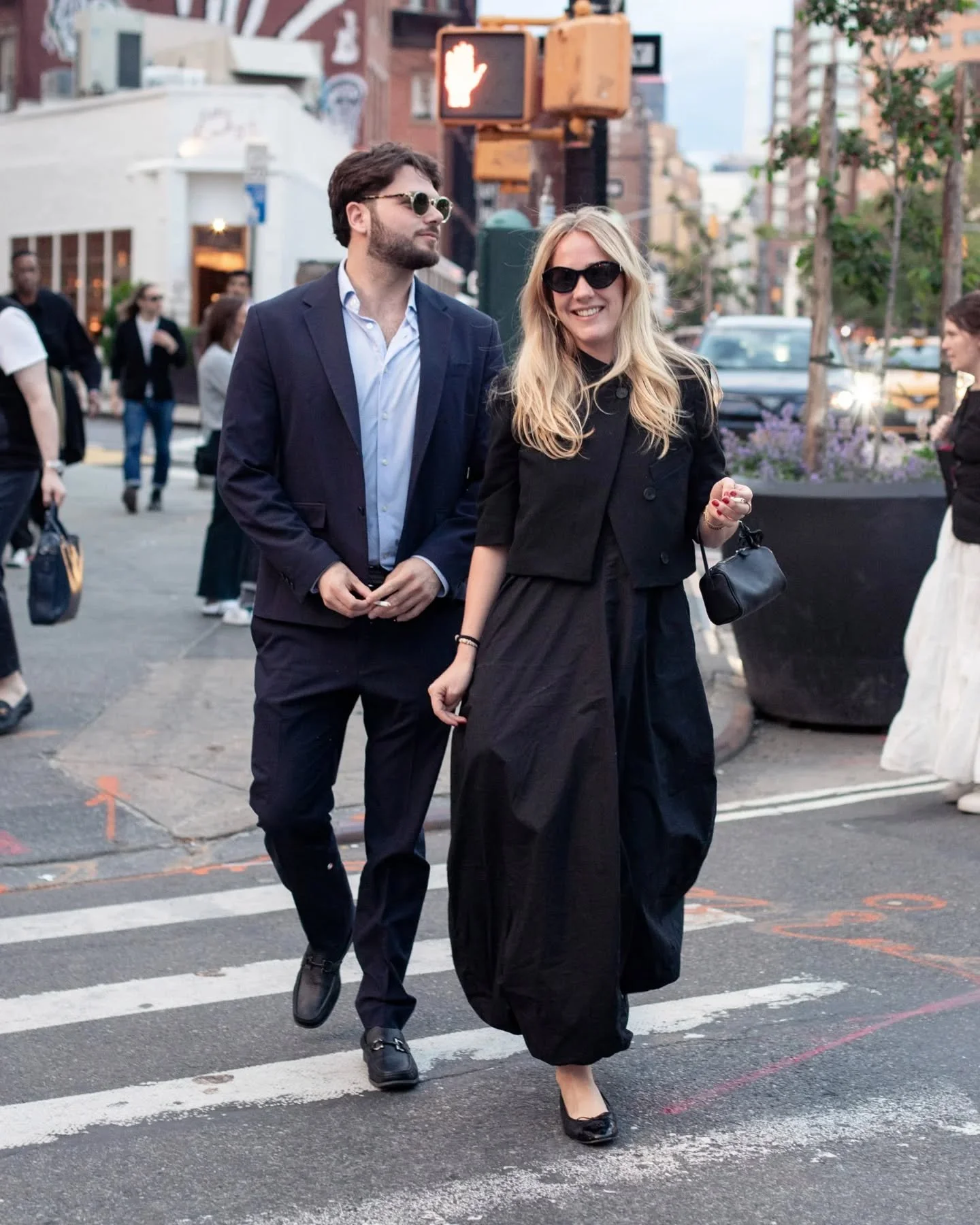 I can get tunnel vision when I shoot street style. This was one of those instances. I saw Evelyn and liked the styling of her blazer. So I talked to her and she told me that she was with her friends &ndash; and that they were coming from a funeral. I