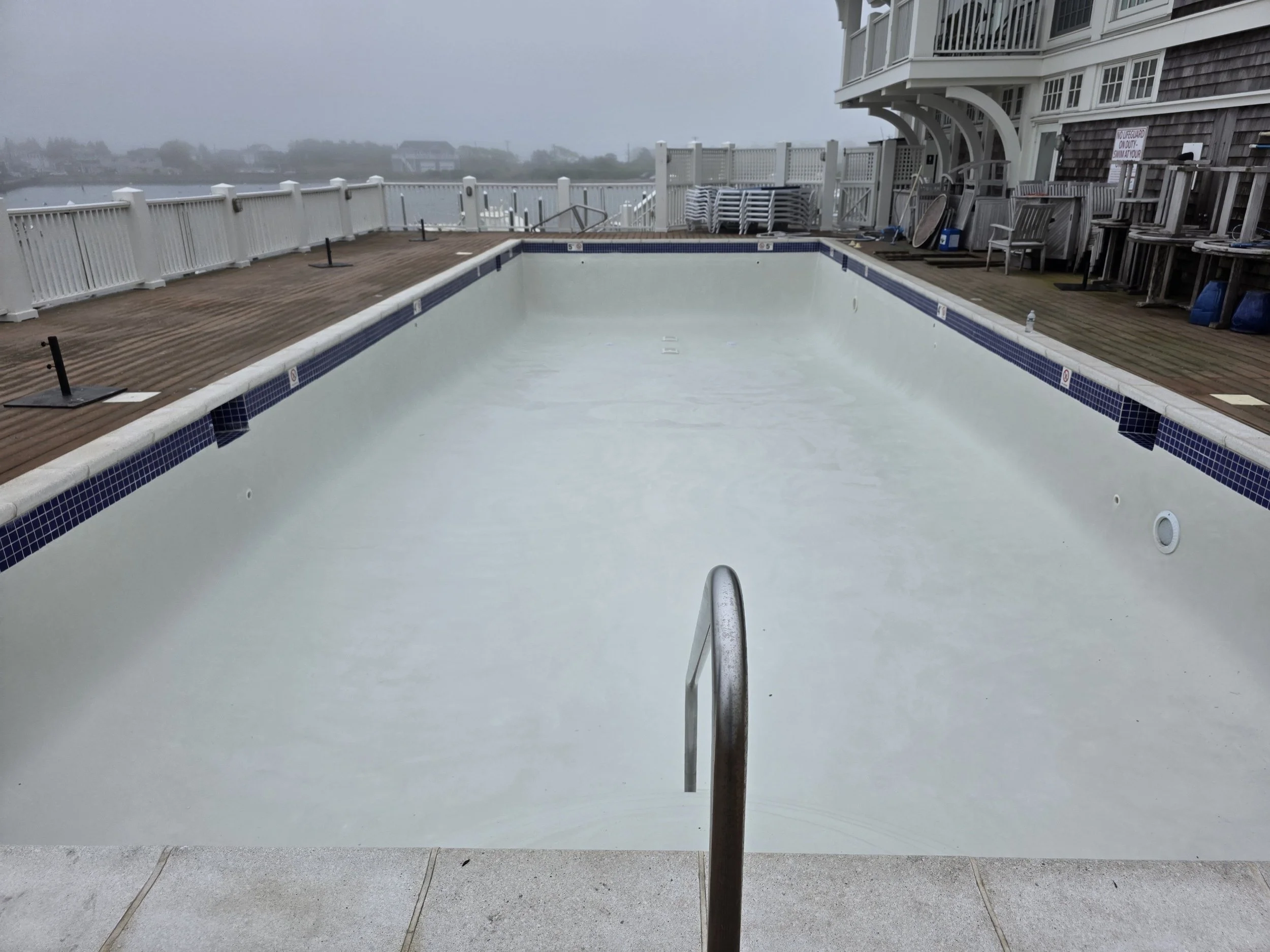 Sakonnet Point Club in Little Compton R.I. with its new white plaster finish.