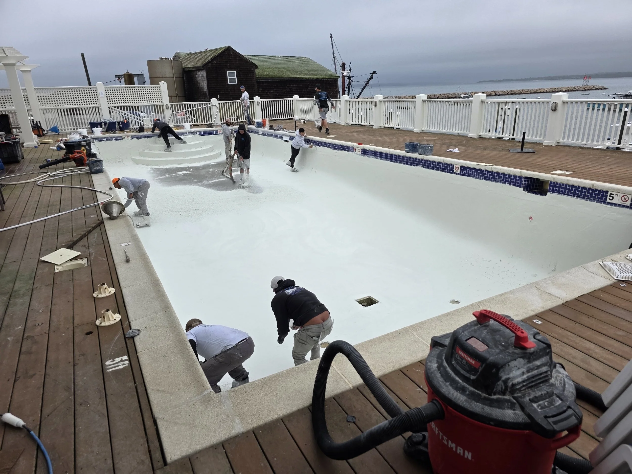 Sakonnet Point Club in Little Compton R.I. getting a much-needed facelift with a new white plaster finish.