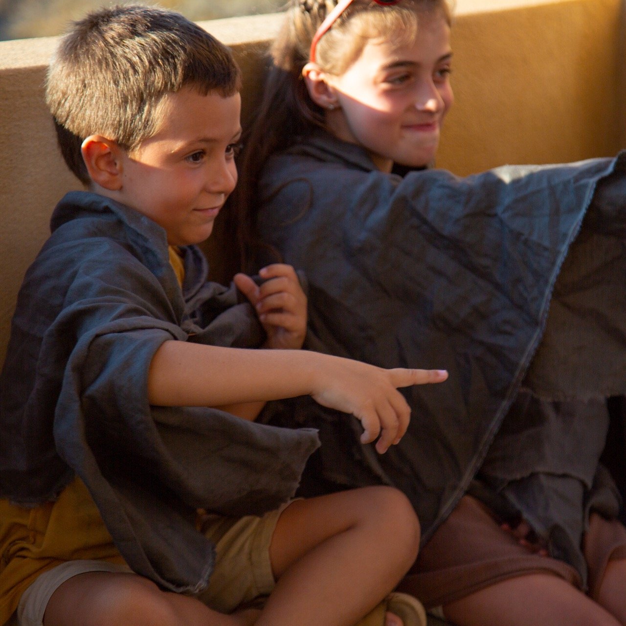 How Children Become Part of History 

In Anamnesis, children from the local villages become part of the performance.

Through movement, breath, and shared ritual, these children dance where ancient feet once danced and they embody myths written into 