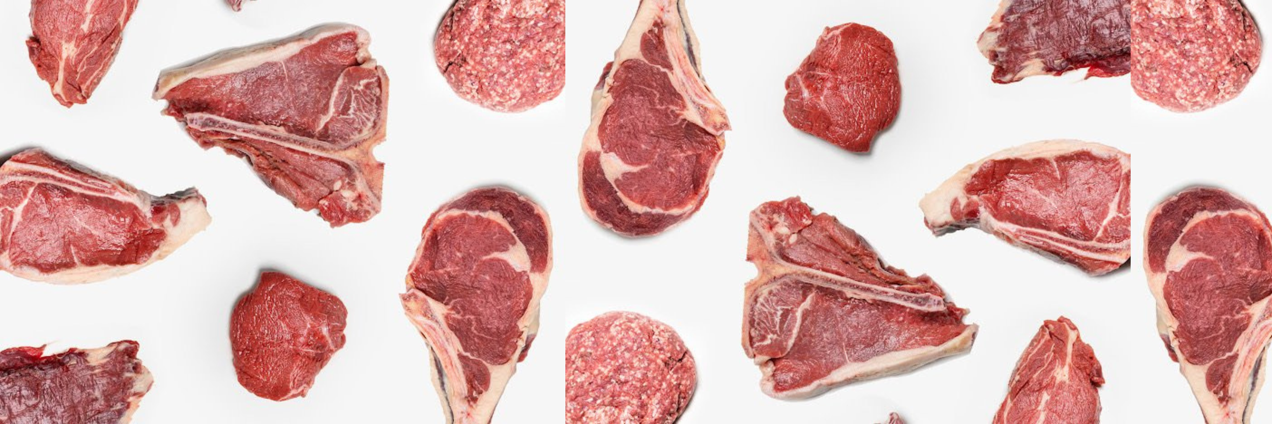Various cuts of raw beef steaks arranged on a white background.