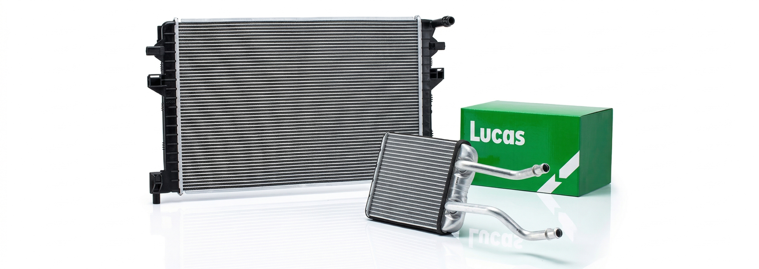 Car radiator and A/C heater core with a green Lucas box in the background.