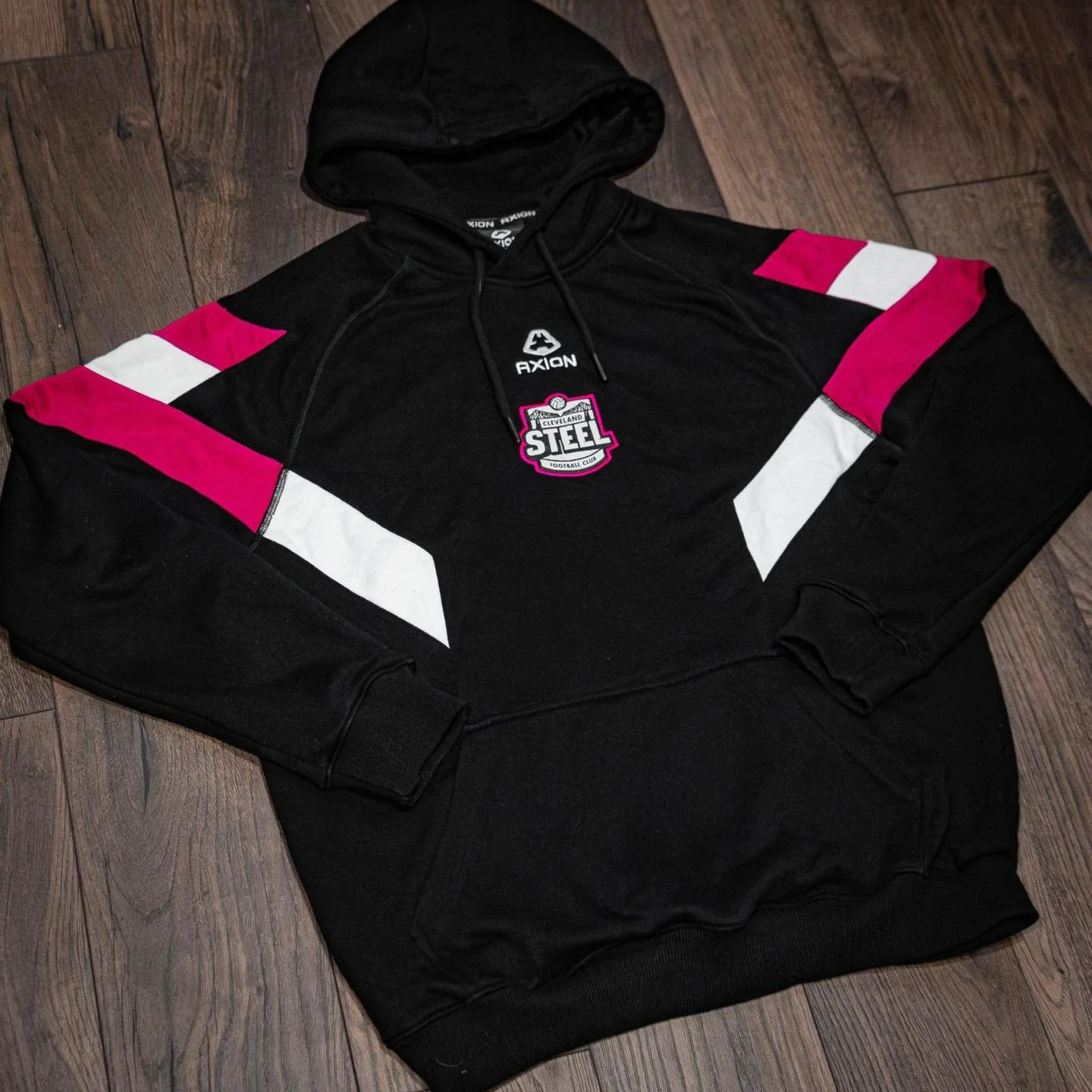 Check out this retro style premium hoodie we created for Cleveland Steel, featuring embroidered and stitched badges with embroidered team name on the back!