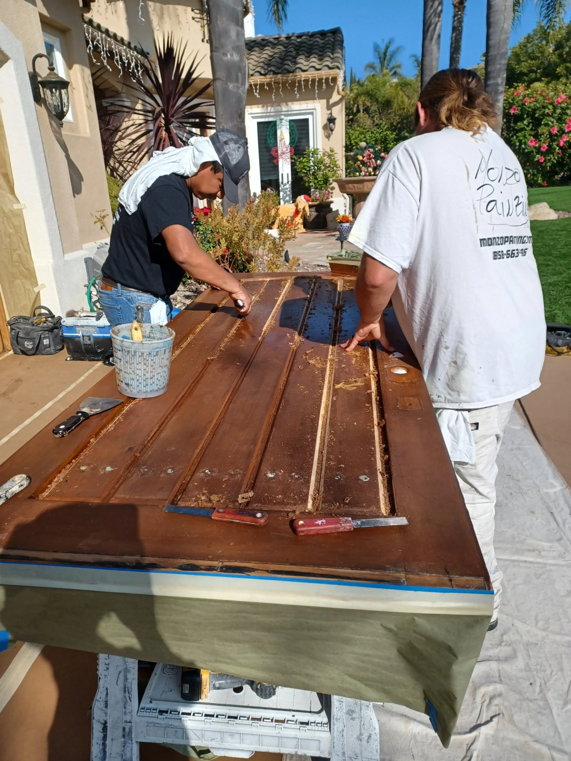 Wood door refinishing before in Encinitas