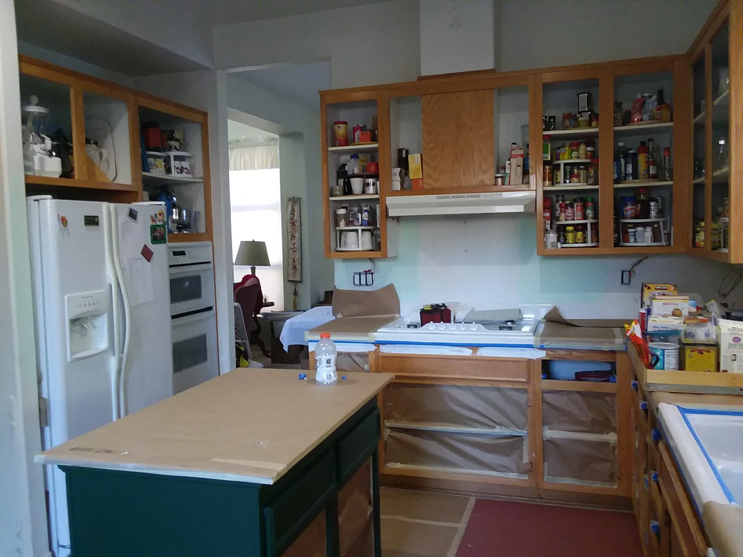 Kitchen Cabinets Painting Before.jpg