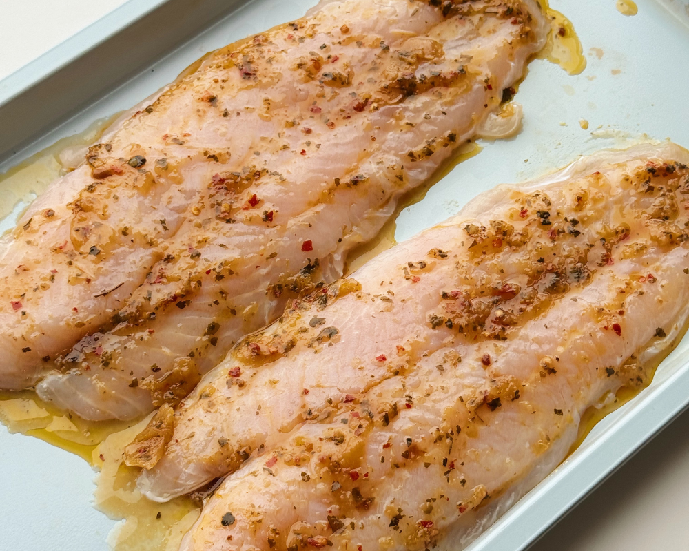  Raw basa on a tray marinated with chimichurri 