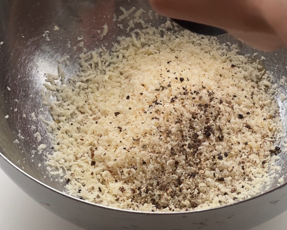 Grated cheese and pepper.png