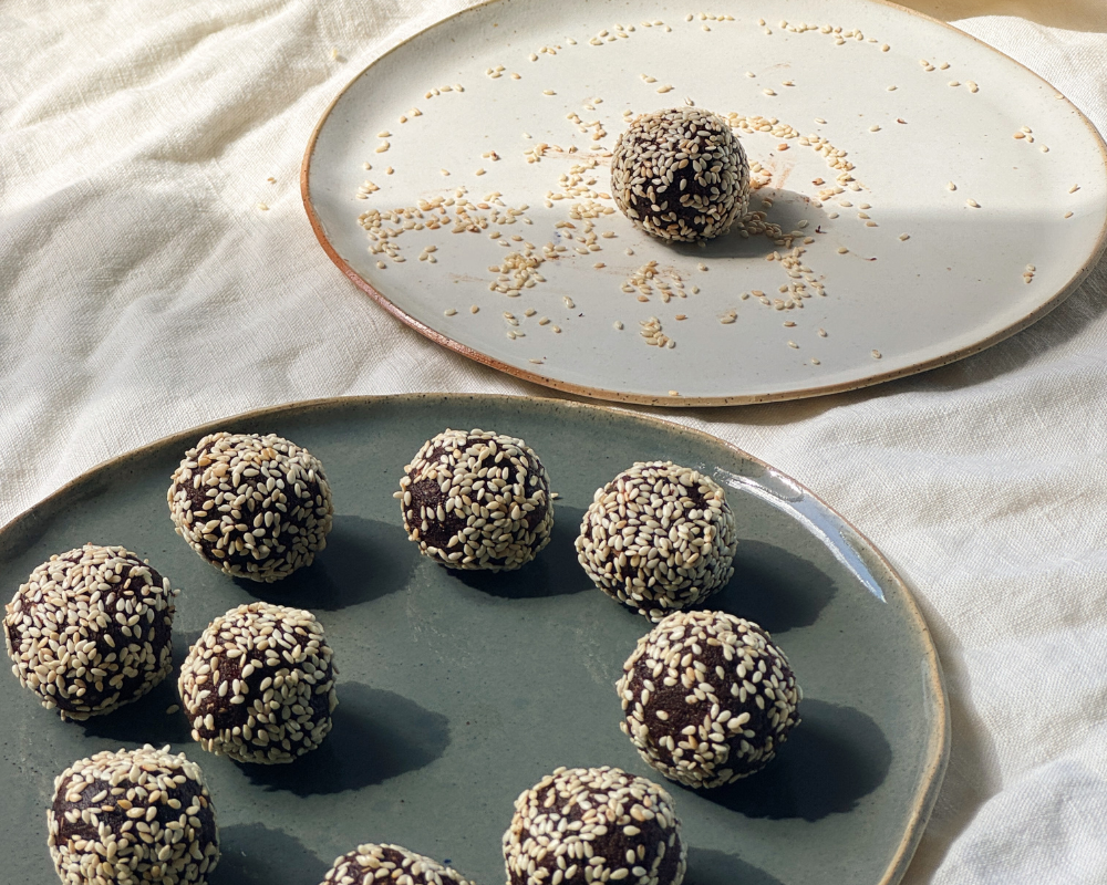 Bliss balls with toasted sesame.png