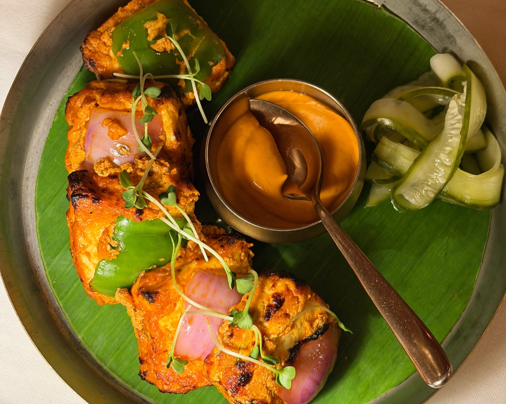  Jodhpuri Paneer, charred tandoori paneer marinated in Mathania chilli, served on a banana leaf at The Johri Restaurant, Jaipur. 