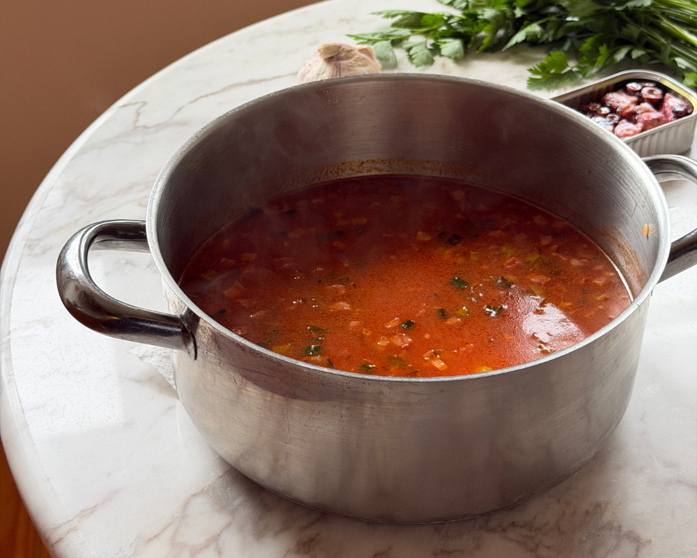  Tomato and stock added to the pot for Arroz de Polvo 