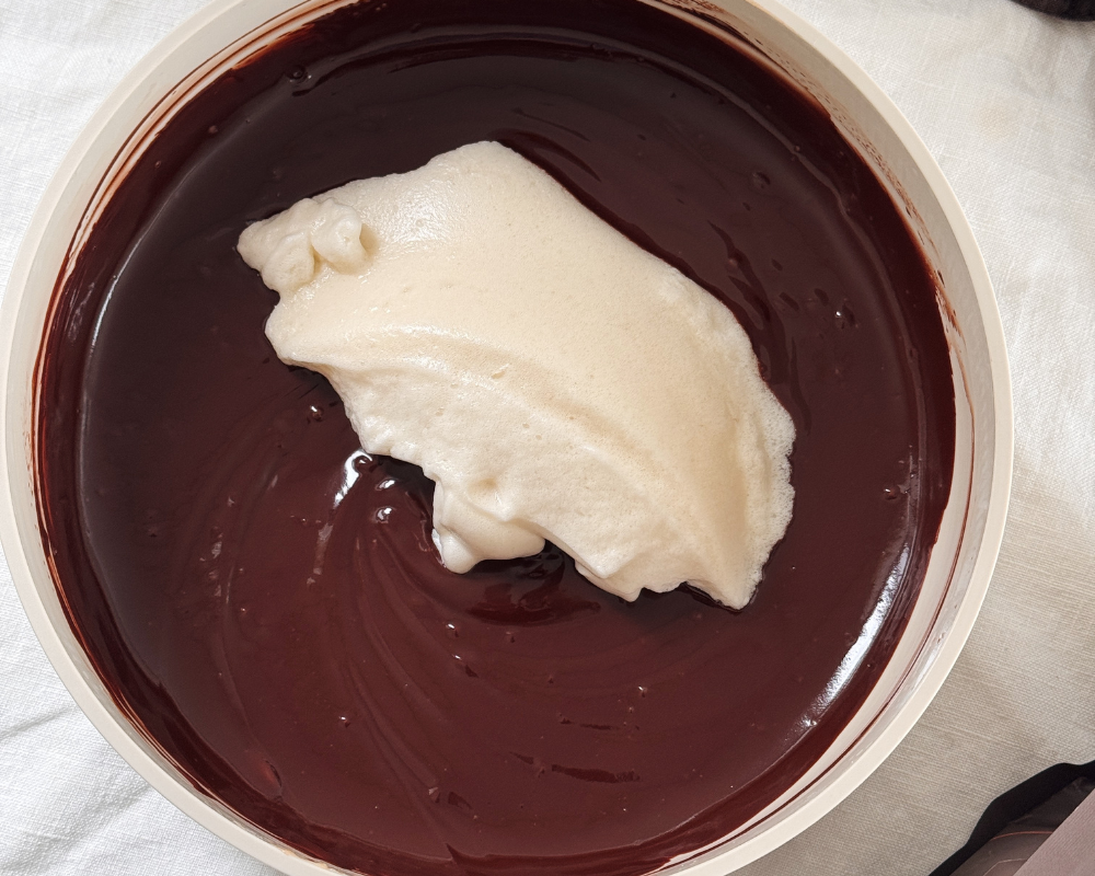  Egg whites folded into baked chocolate ganache batter 