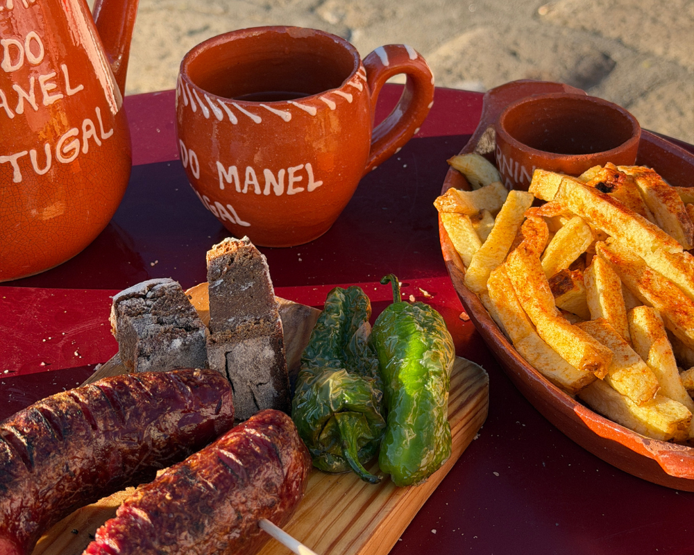  Grilled chouriço, padrón peppers, bread and chips at Adega do Manel 